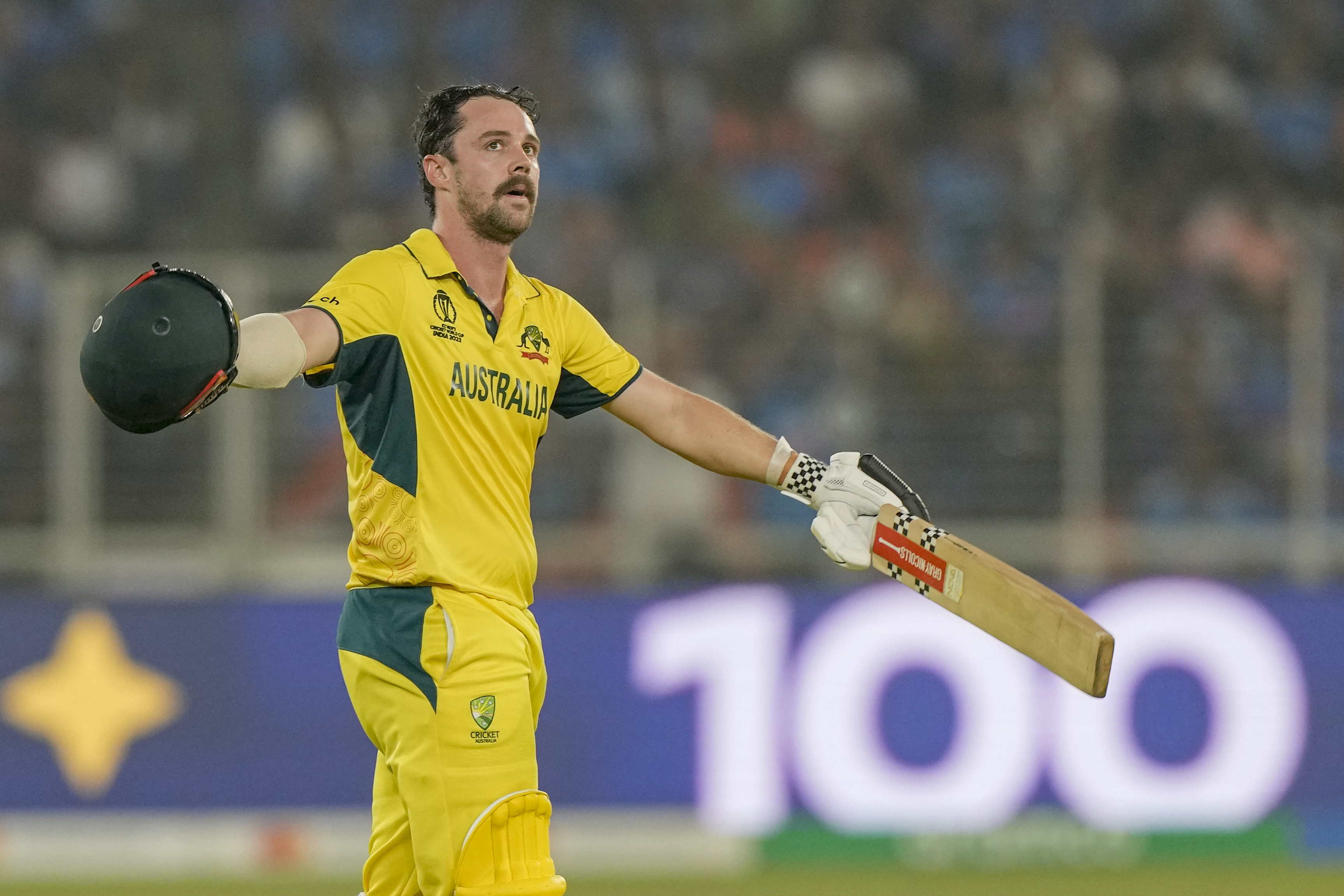Australia's Travis Head celebrates after scoring a century during the ICC Men's Cricket World Cup final match between Australia and India in Ahmedabad, India, Sunday, Nov.19, 2023. 