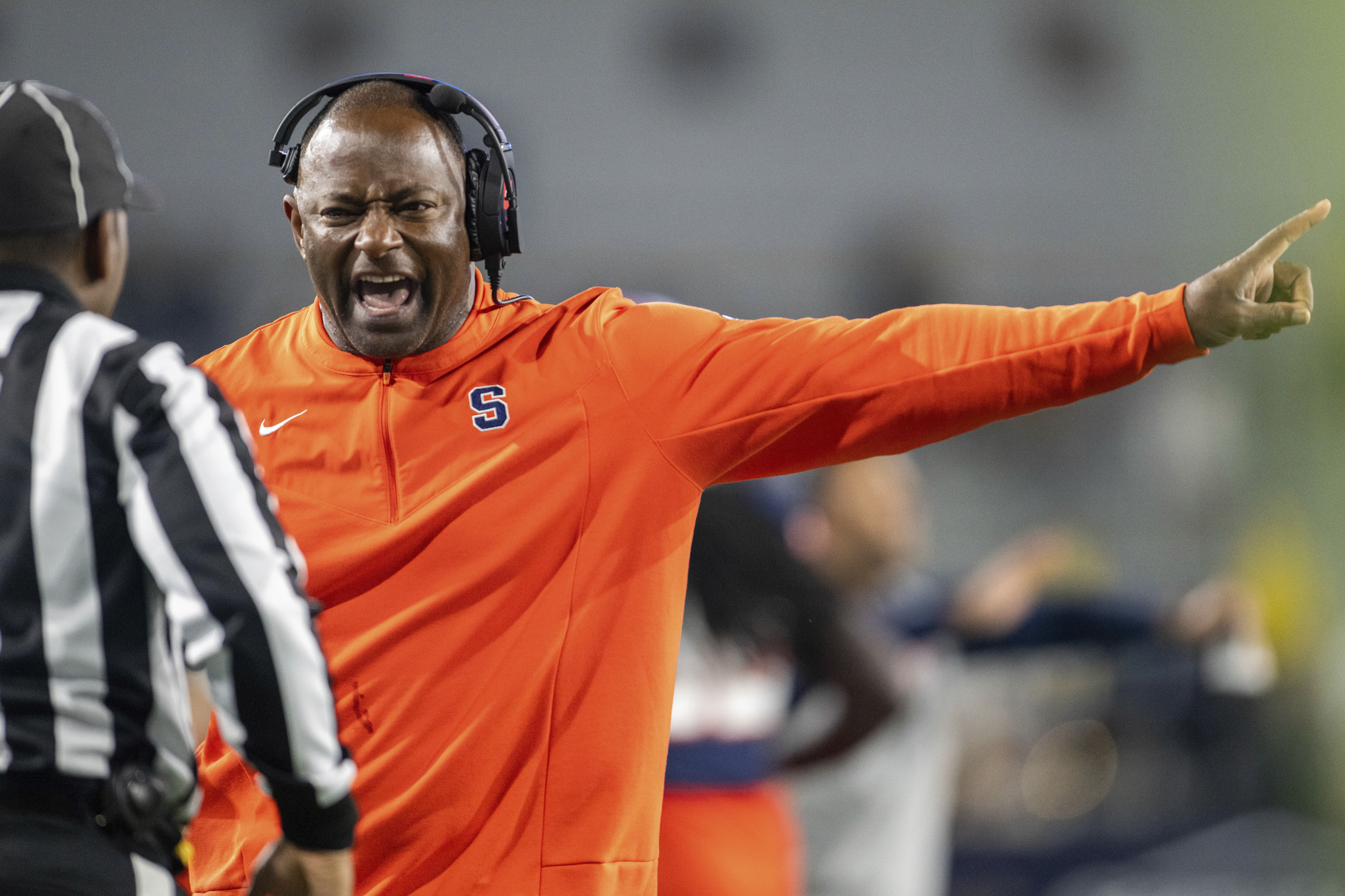 Syracuse coach Dino Babers yells to an official during the second half of the team's NCAA college football game against Georgia Tech, Saturday, Nov. 18, 2023, in Atlanta. 
