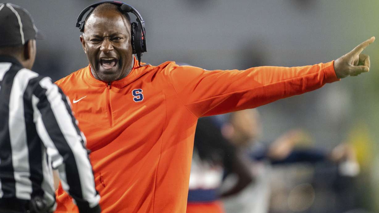 Syracuse coach Dino Babers yells to an official during the second half of the team's NCAA college football game against Georgia Tech, Saturday, Nov. 18, 2023, in Atlanta.