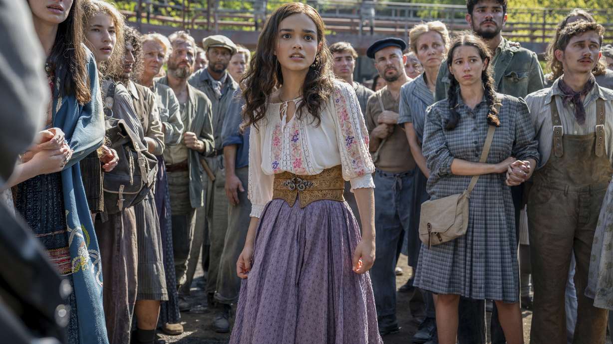 This image released by Lionsgate shows Rachel Zegler, center, in a scene from "The Hunger Games: The Ballad of Songbirds and Snakes."