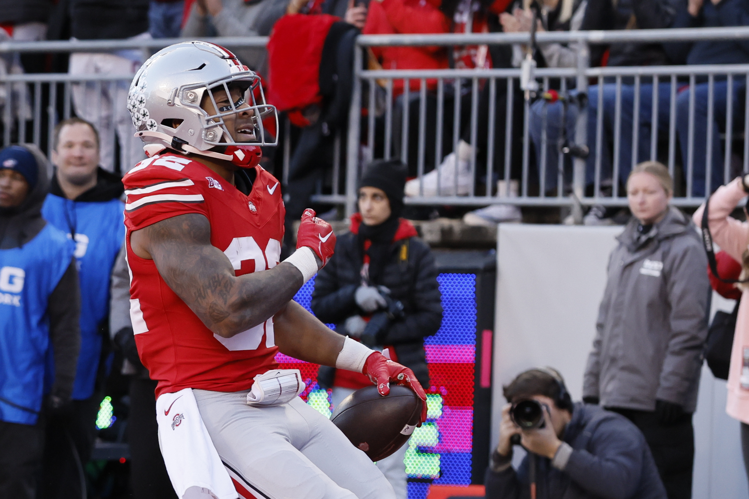 Ohio State running back TreVeyon Henderson celebrates after his touchdown against Minnesota during the first half of an NCAA college football game Saturday, Nov. 18, 2023, in Columbus, Ohio. 