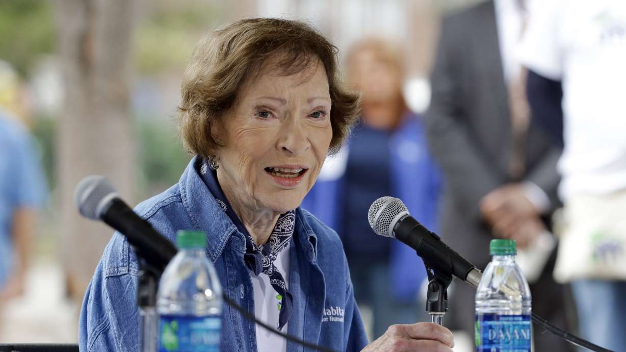 Former first lady Rosalynn Carter answers questions during a news conference at a Habitat for Humanity building site, Nov. 2, 2015, in Memphis, Tenn. She died Sunday at the age of 96.
