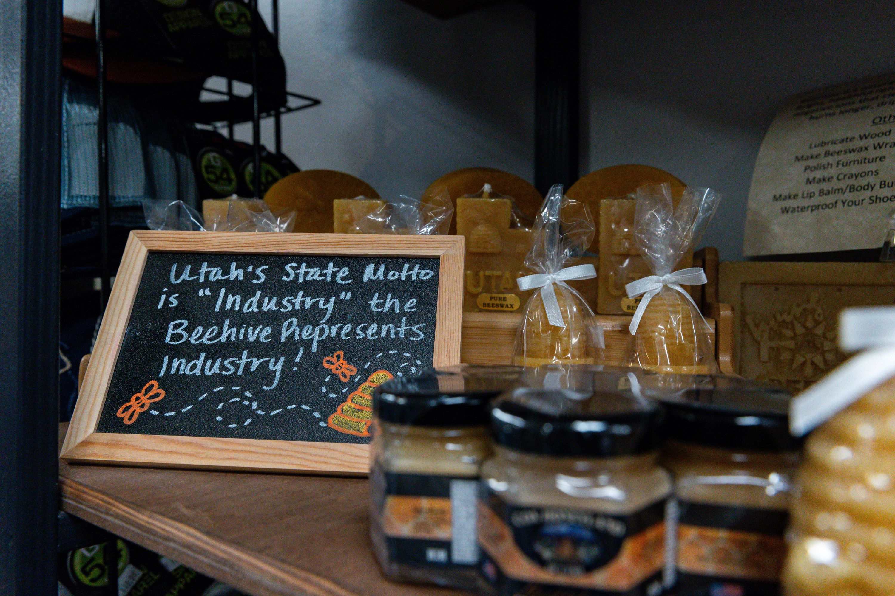 Beehive-themed souvenirs sit on a shelf at Uniquely Utah Souvenir Co. in downtown Salt Lake City on Nov. 13.