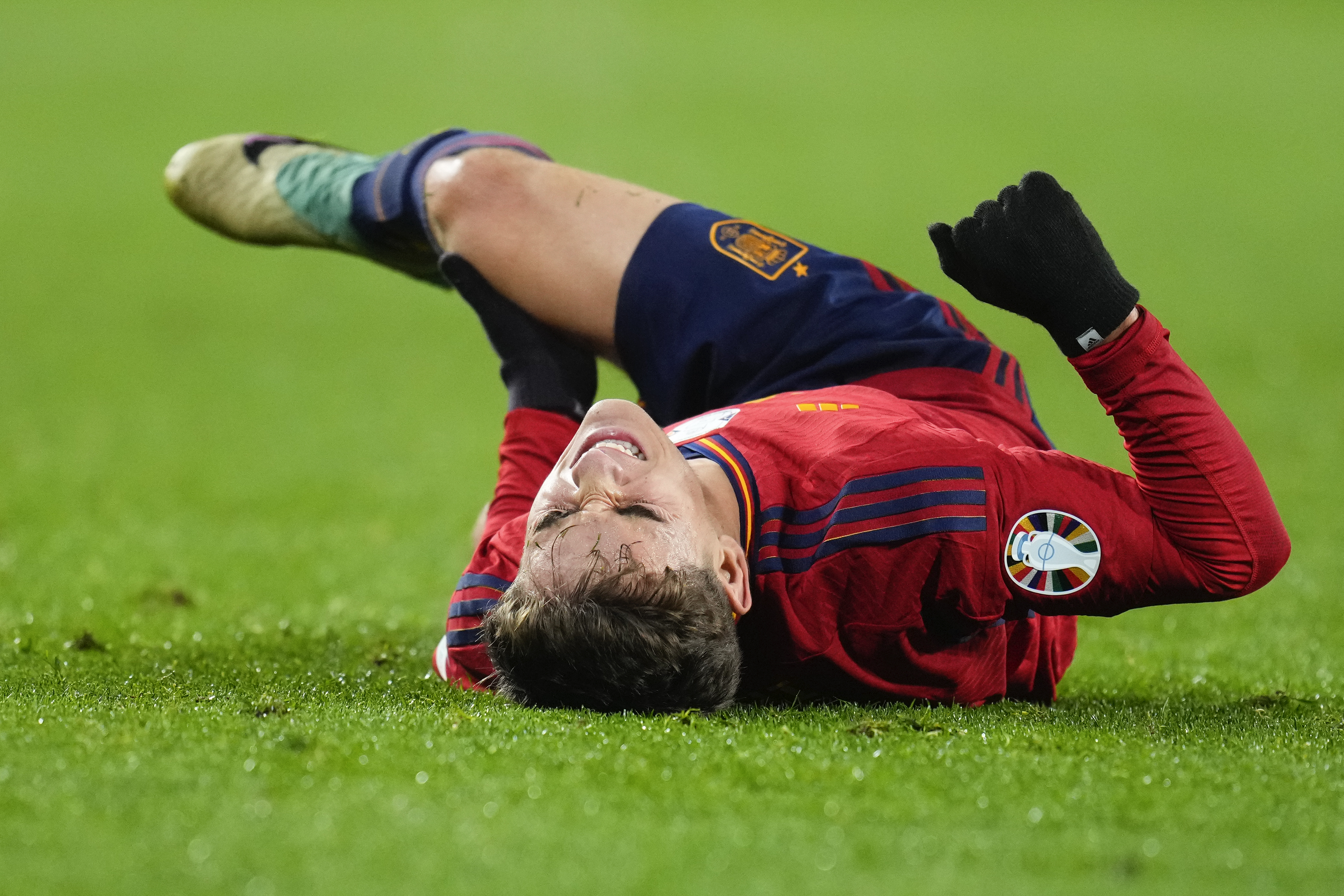 Spain's Gavi Paez reacts after injuring his leg during the Euro 2024 group A qualifying soccer match between Spain and Georgia at Jose Zorrilla Stadium in Valladolid, Spain, Sunday, Nov. 19 23, 2023. 