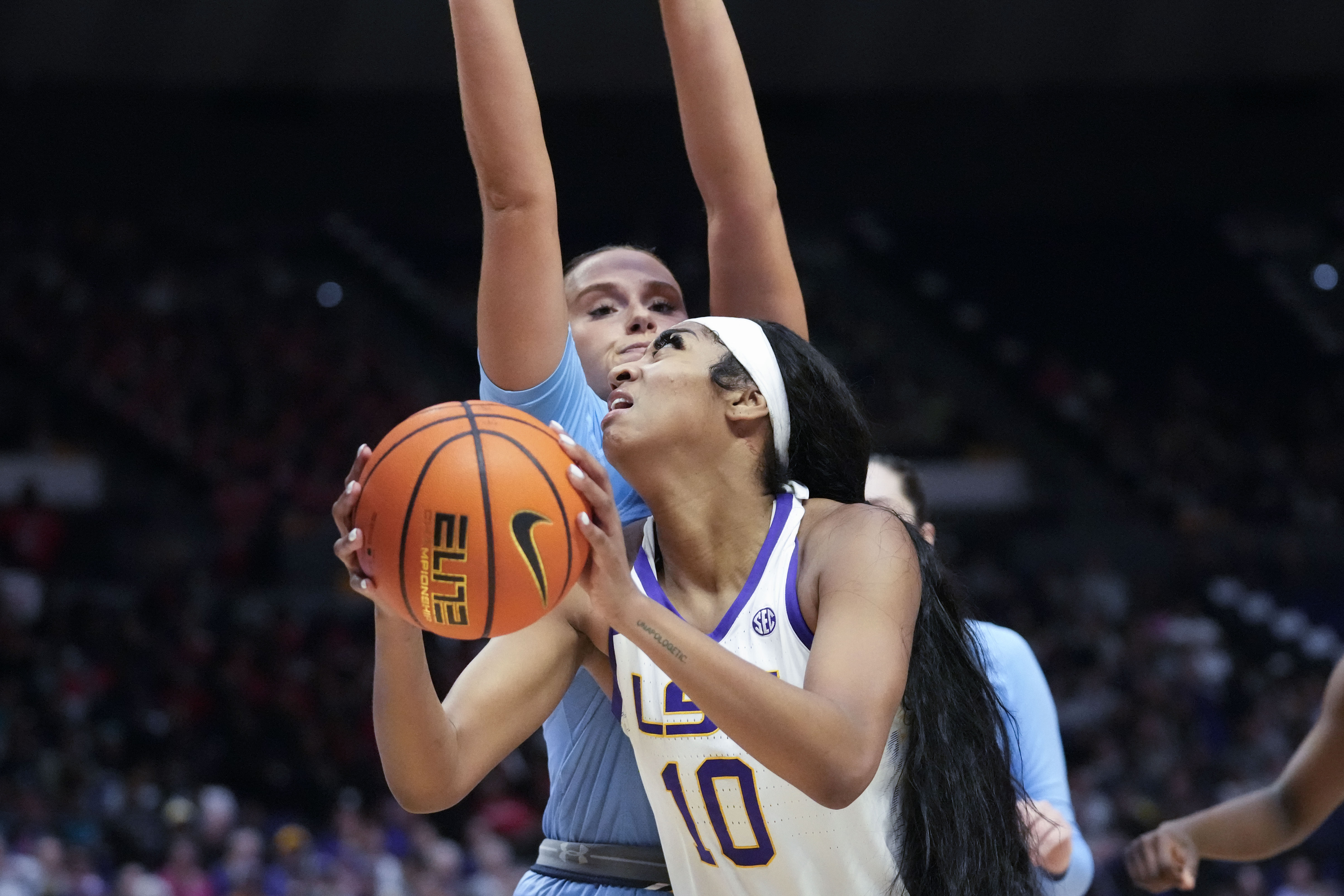 LSU forward Angel Reese (10) drives to the basket in the first half an NCAA college basketball game against Kent State in Baton Rouge, La., Tuesday, Nov. 14, 2023.