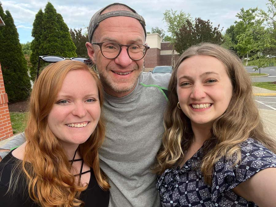 Abby, John and Hannah are pictured. John's oldest child Hannah is going to come home for Thanksgiving to exchange vows with Abby.