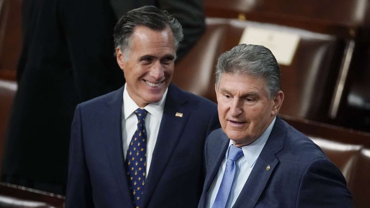Sen. Joe Manchin, D-W.Va., and Sen. Mitt Romney, R-Utah, at the Capitol on March 1, 2022, in Washington. A PAC created to recruit them to a third-party presidential ticket committed to reveal its donors and called on its critics to do the same.