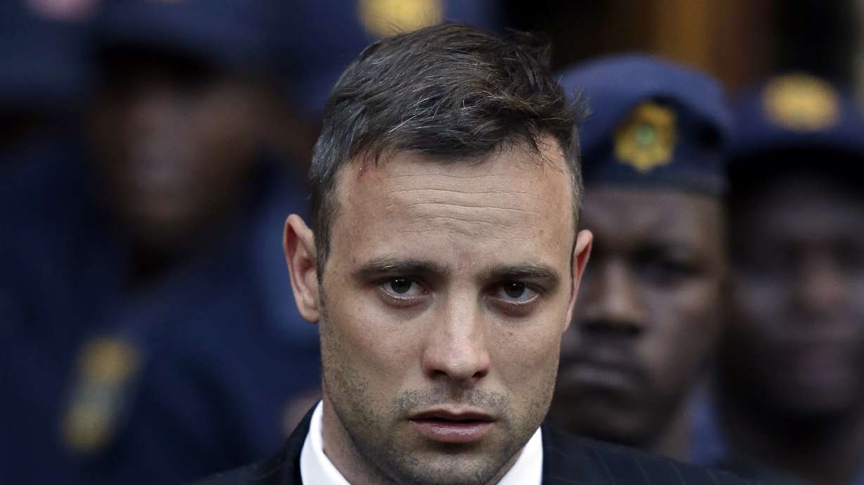 FILE - Oscar Pistorius leaves the High Court in Pretoria, South Africa, Wednesday, June 15, 2016, after his sentencing proceedings. Pistorius could be granted parole on Friday, Nov. 24, 2023 after nearly 10 years in prison for killing his girlfriend. The double-amputee Olympic runner was convicted of a charge comparable to third-degree murder for shooting Reeva Steenkamp in his home in 2013. He has been in prison since late 2014.