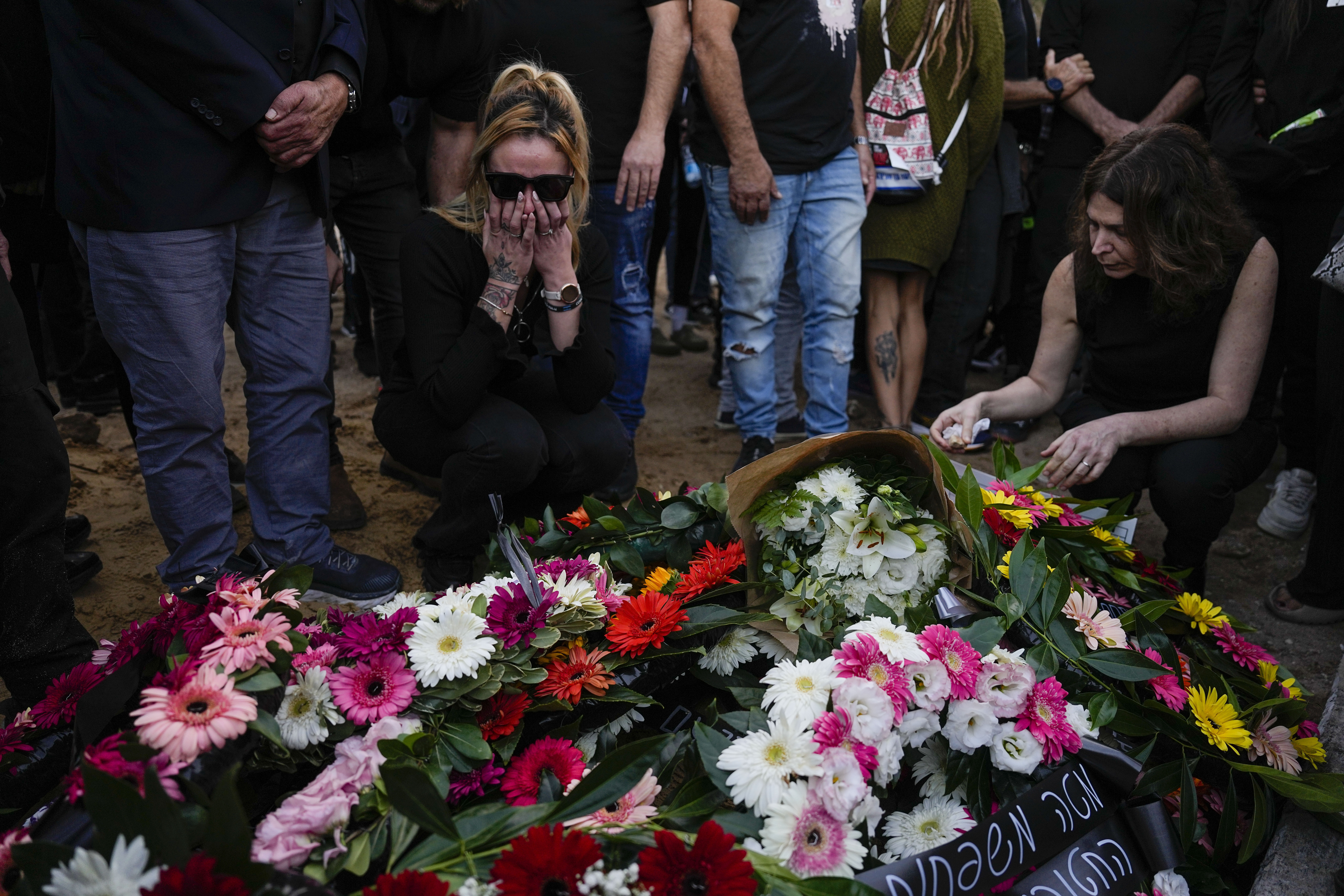 Mourners gather in grief during the funeral of Shani Gabay in the northern Israeli town of Yokneam, Thursday. Gabay, 25, was killed with at least 360 Israelis by Hamas militants at the outdoor music festival, among the total 1,200 people killed during Hamas' bloody Oct. 7 cross-border assault.