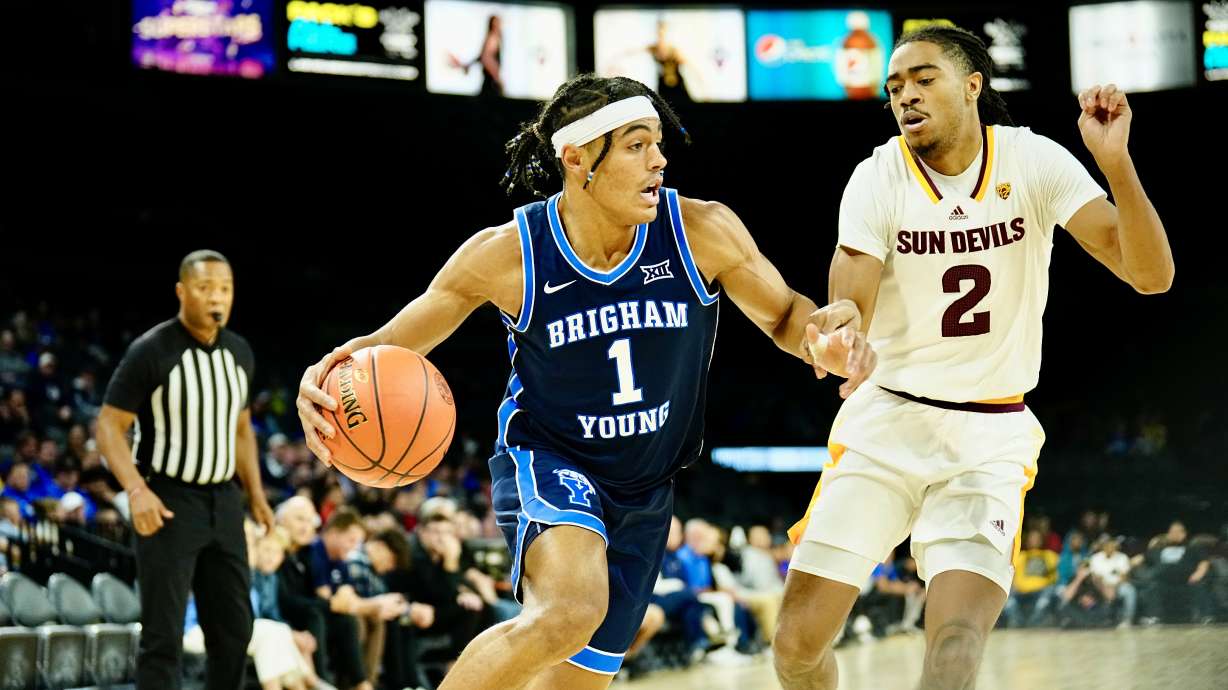 BYU guard Trey Stewart drives against Arizona State during an NCAA college basketball game, Thursday, Nov. 24, 2023 at Michelob ULTRA Arena in Las Vegas.