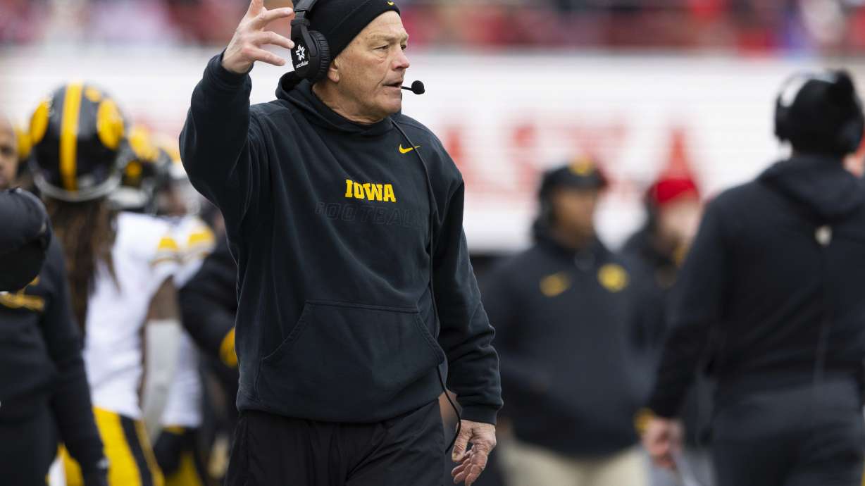 Iowa head coach Kirk Ferentz yells to his team as they play against Nebraska during the first half of an NCAA college football game, Friday, Nov. 24, 2023, in Lincoln, Neb.