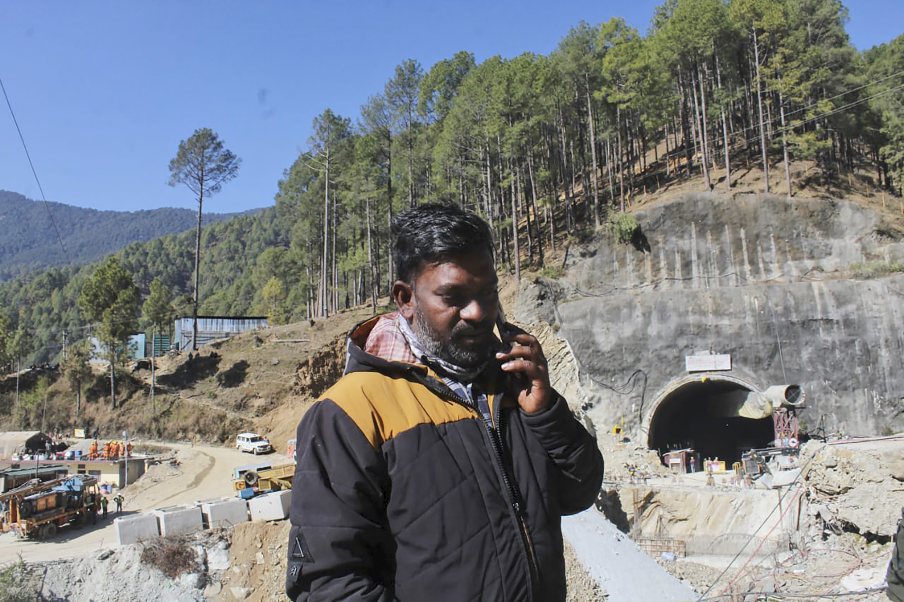 Haridwar Sharma waits for news of his brother Sushil, who is among those trapped inside an under-construction road tunnel that collapsed in the northern Indian state of Uttarakhand, on Friday. Sushil is one of 41 construction workers who have been trapped for nearly two weeks.