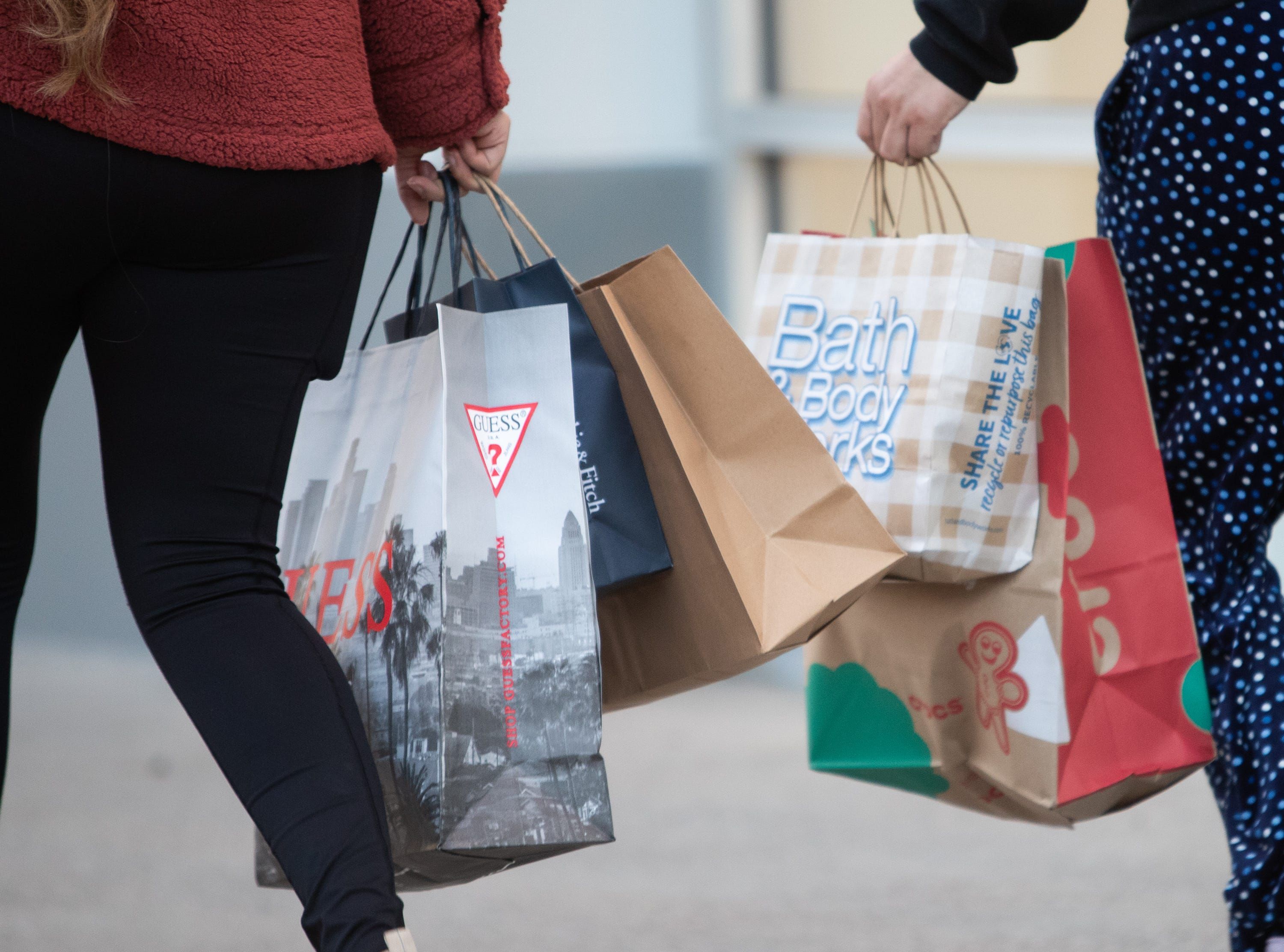 Black Friday shoppers at Tanger Phoenix Outlets in Glendale, Arizona, on Friday. Holiday shoppers were eager to participate in Black Friday this year.