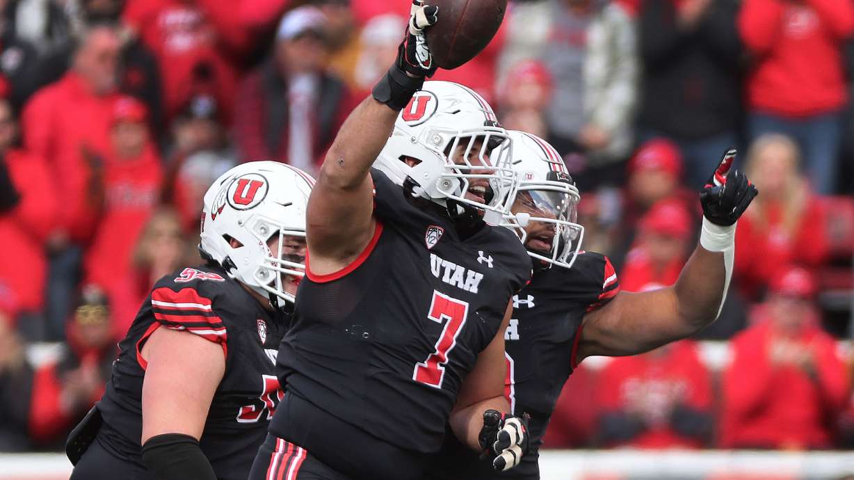 Utah Utes defensive end Van Fillinger (7) recovers a Colorado Buffaloes fumble in Salt Lake City on Saturday, Nov. 25, 2023.