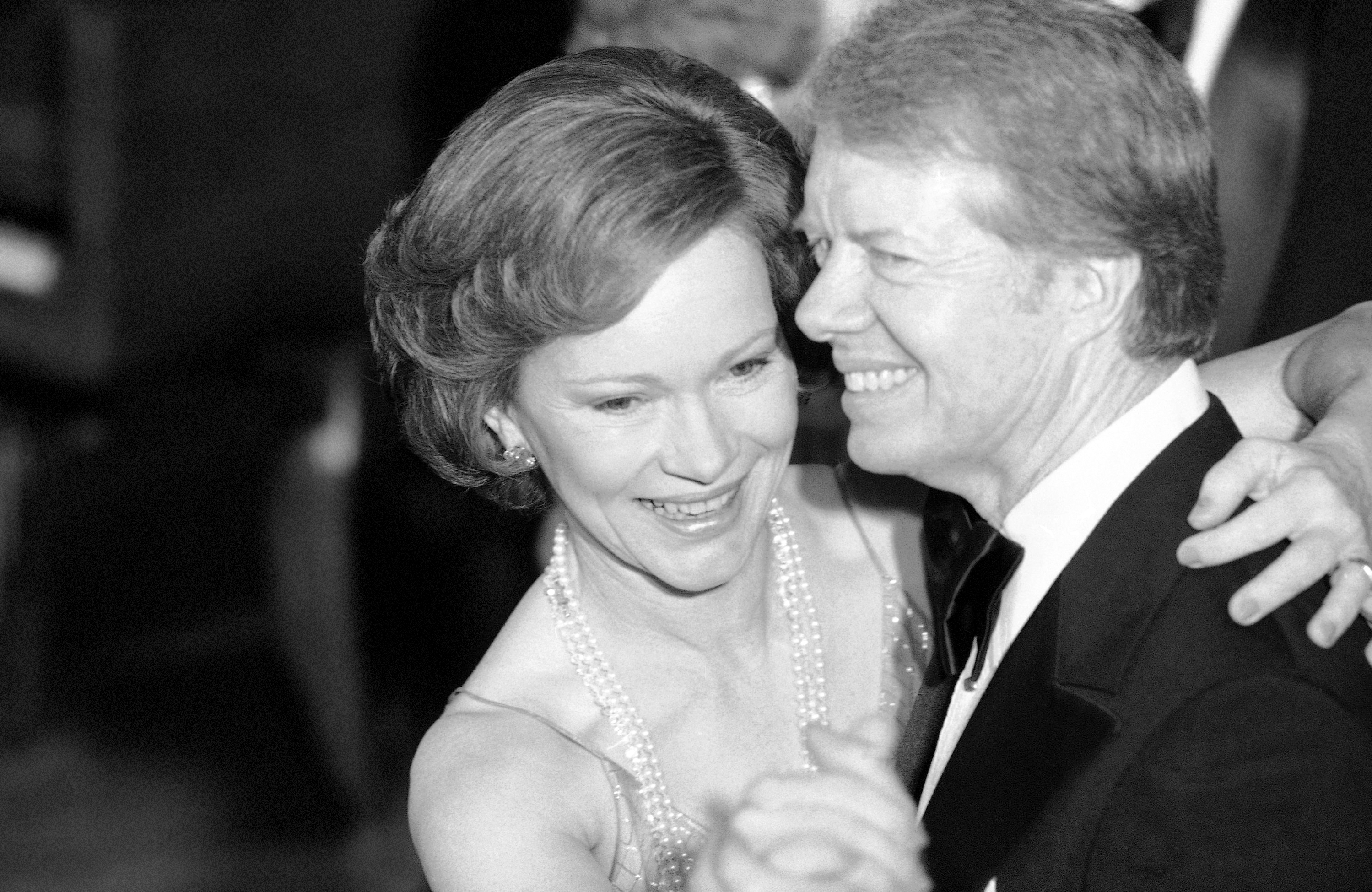 President Jimmy Carter and his wife Rosalynn lead their guests in dancing at the annual Congressional Christmas Ball at the White House in Washington on Dec. 13, 1978.