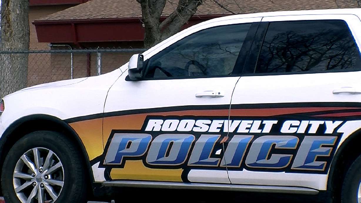 A Roosevelt police officer sustained minor injuries in a head-on collision with a vehicle driving the wrong way.