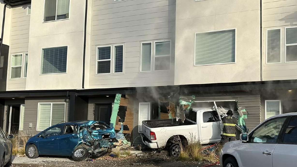 A man driving a truck experienced an unknown medical condition, causing him to lose consciousness. His car crashed into some town houses in Pleasant Grove, where one man was pinned in his living room and injured by the crash, police said.