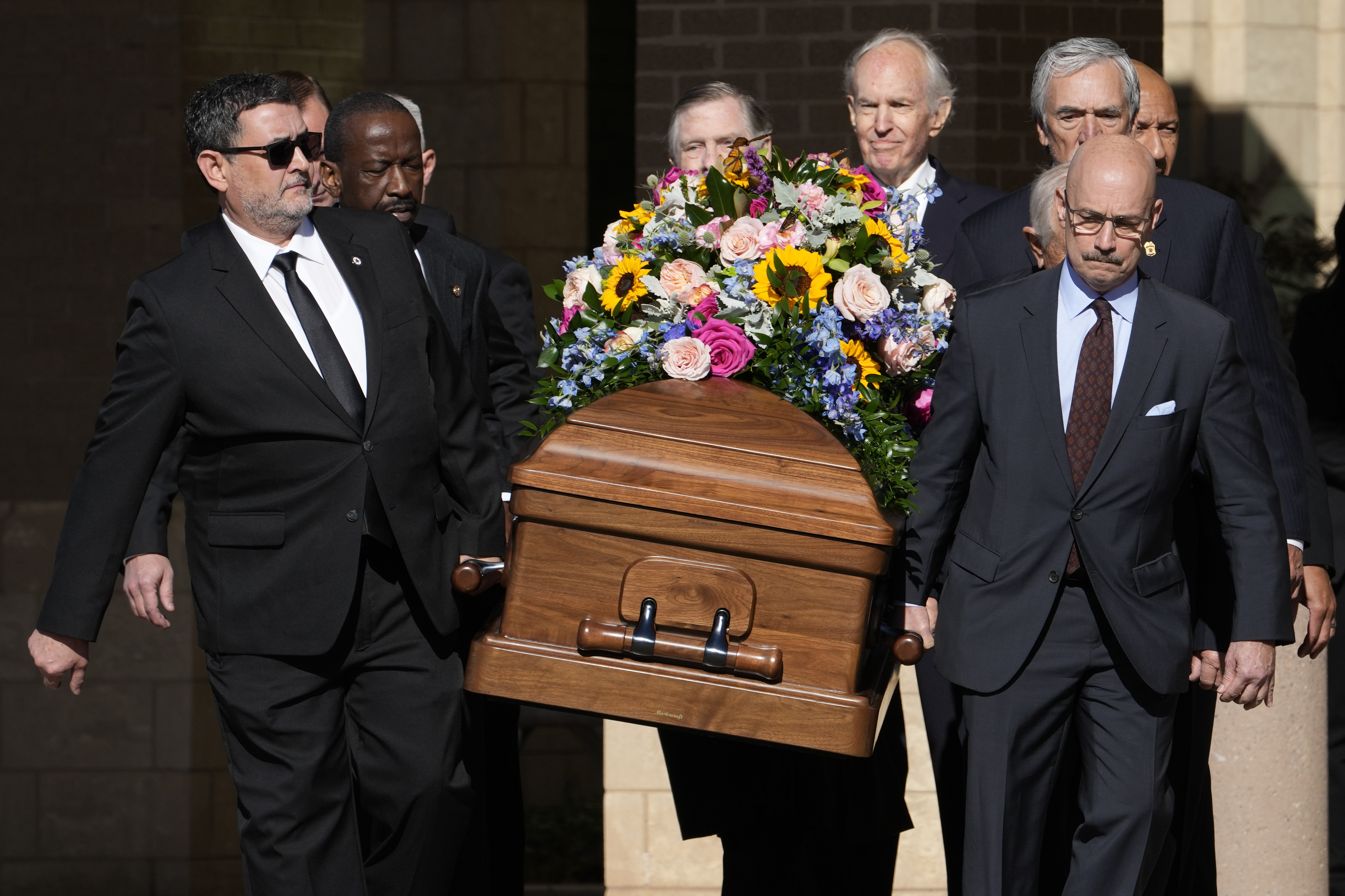 Former and current U.S. Secret Service agents carry casket of former first lady Rosalynn Carter at Phoebe Sumter Medical Center in Americus, Ga., Monday, Nov. 27, 2023. The former first lady died on Nov. 19. She was 96.
