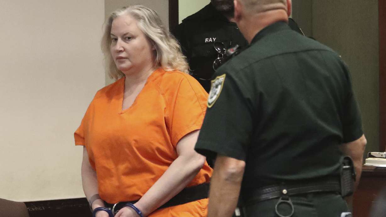 WWE Hall of Famer Tammy Sytch is escorted to the defense table by Volusia Couty Sheriff's bailiffs for her sentencing, Monday, Nov. 27, 2023, at the S. James Foxman Justice Center in Daytona Beach, Fla., for a DUI crash that killed a man in 2022.