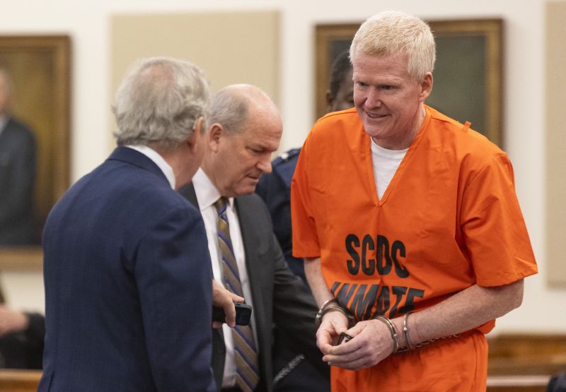 Alex Murdaugh talks with his attorneys Dick Harpootlian, left, and Jim Griffin during his sentencing for stealing from 18 clients, Tuesday at the Beaufort County Courthouse in Beaufort, S.C.