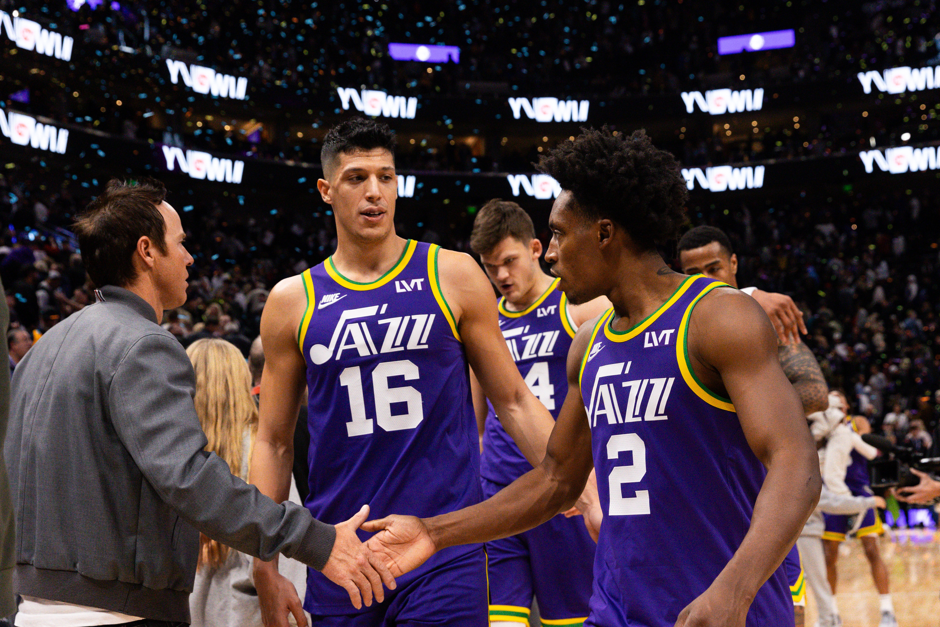 Utah Jazz teammates Simone Fontecchio (16) and Collin Sexton (2) walk off the court after their 114-112 win over the New Orleans Pelicans at the Delta Center in Salt Lake City on Monday, Nov. 27, 2023.