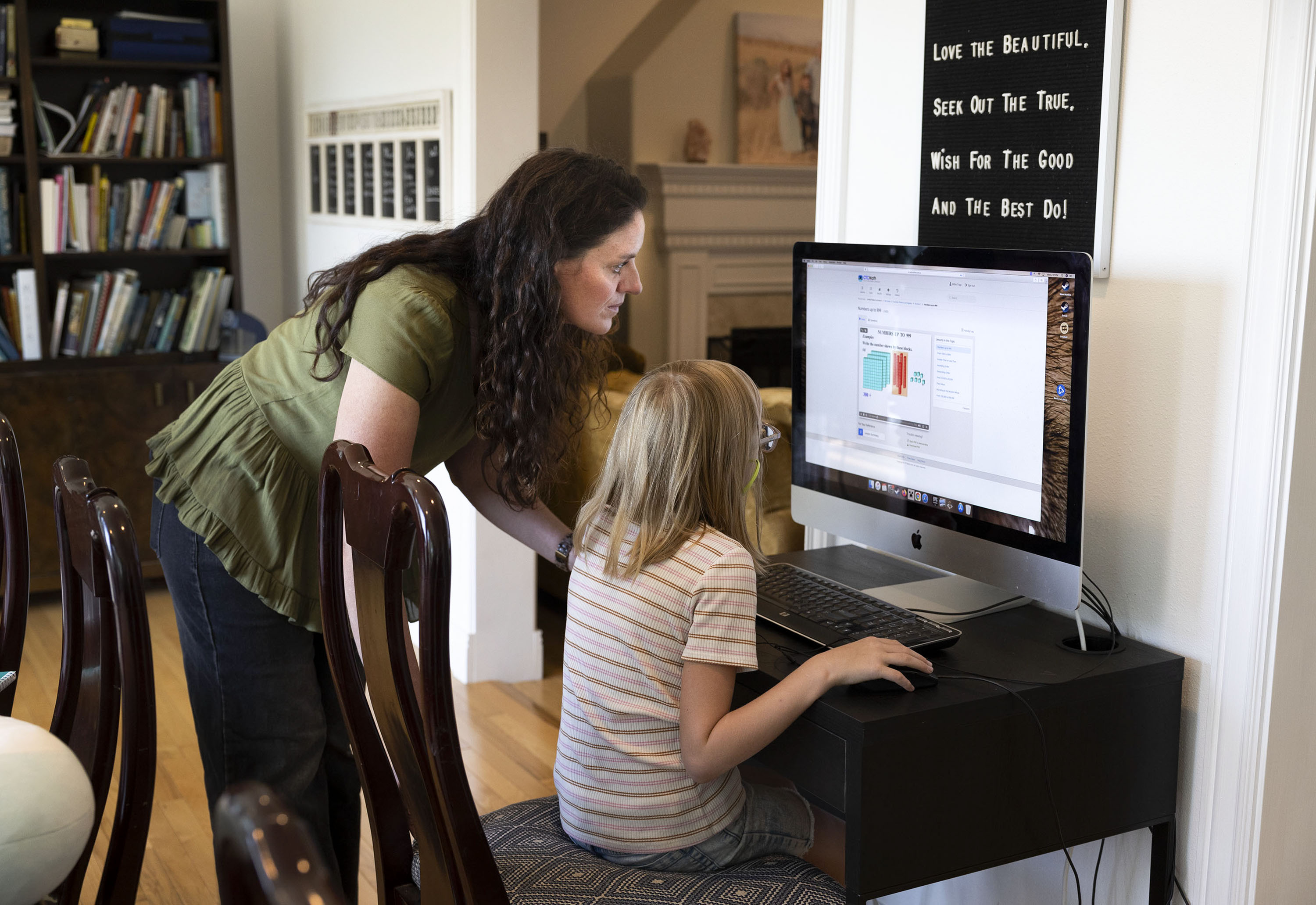 Karyn Tripp and her daughter, Millie, 9, work on Millie’s math with the CTCMath curriculum at their home in Cedar Hills on Wednesday, Aug. 30. allow homeschooling families to have more robust options for educating their children at home.