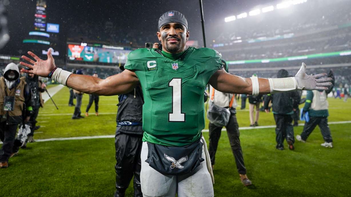 Philadelphia Eagles quarterback Jalen Hurts celebrates after scoring the game winning touchdown against the Buffalo Bills during overtime in an NFL football game Sunday, Nov. 26, 2023, in Philadelphia.