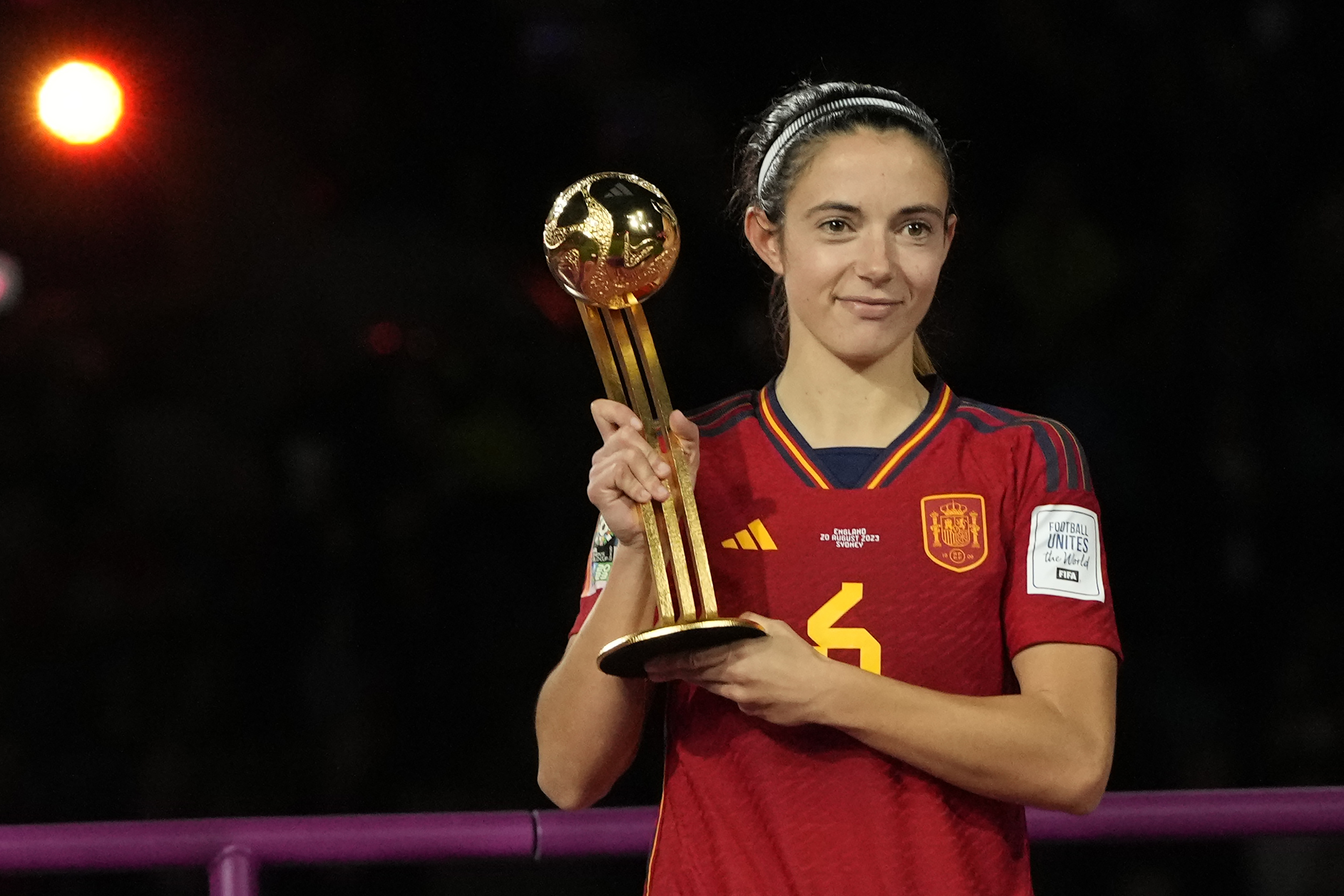 FILE - Spain's Aitana Bonmati holds the Player of the Tournament trophy after the final of Women's World Cup soccer between Spain and England at Stadium Australia in Sydney, Australia, Sunday, Aug. 20, 2023. Lionel Messi is the favorite to win a record-extending eighth Ballon d'Or on Monday, Oct. 30. Spain’s Aitana Bonmati is the favorite for the women’s award. 