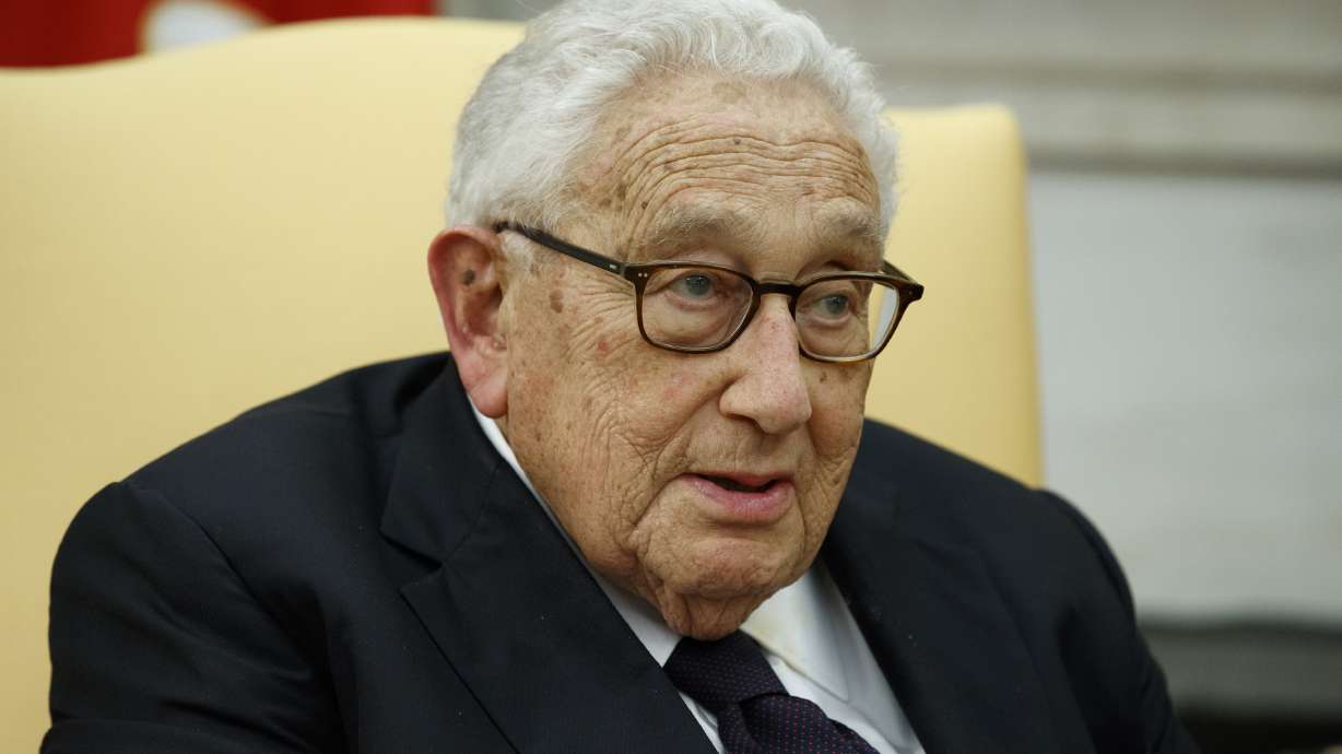 Former Secretary of State Henry Kissinger speaks during a meeting with President Donald Trump in the Oval Office of the White House, Oct. 10, 2017, in Washington. Kissinger died Wednesday. He was 100.