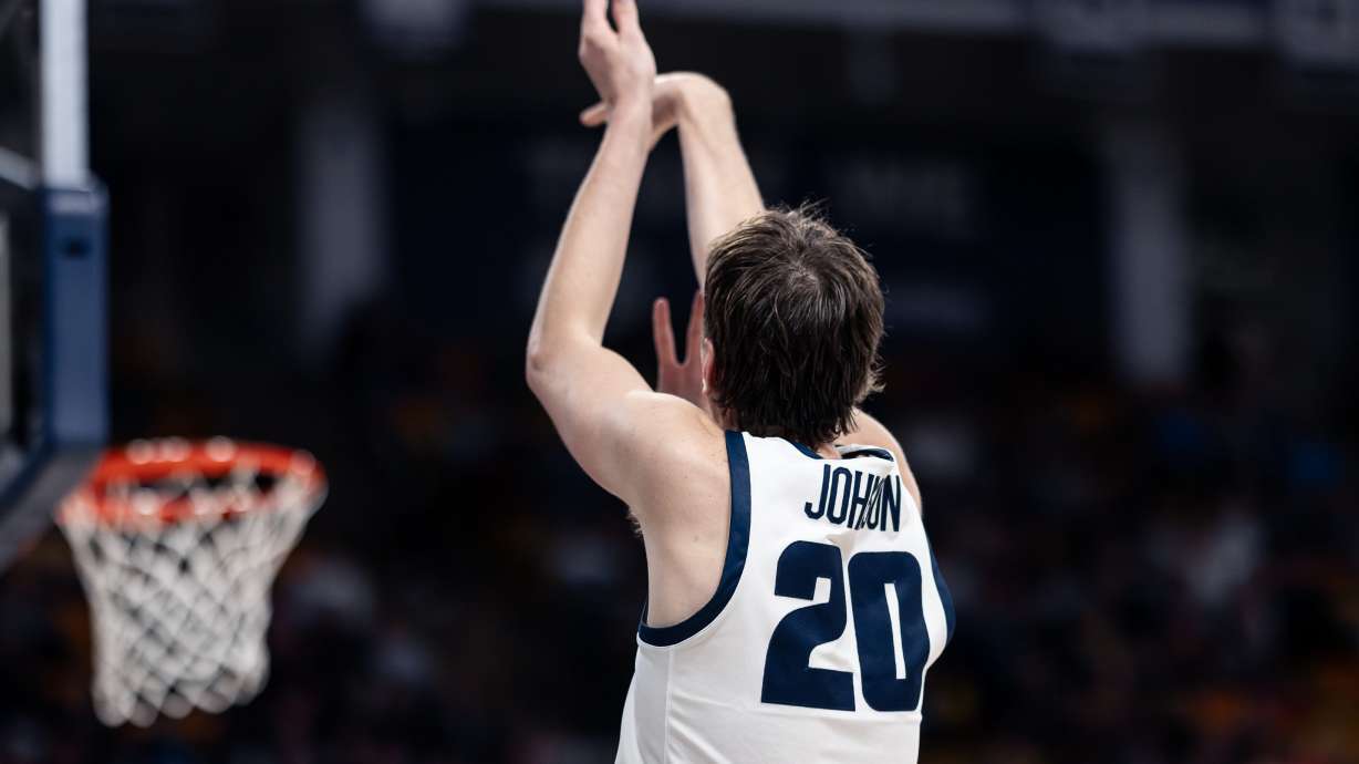 Utah State's Isaac Johnson during a game in the 2023-24 season.