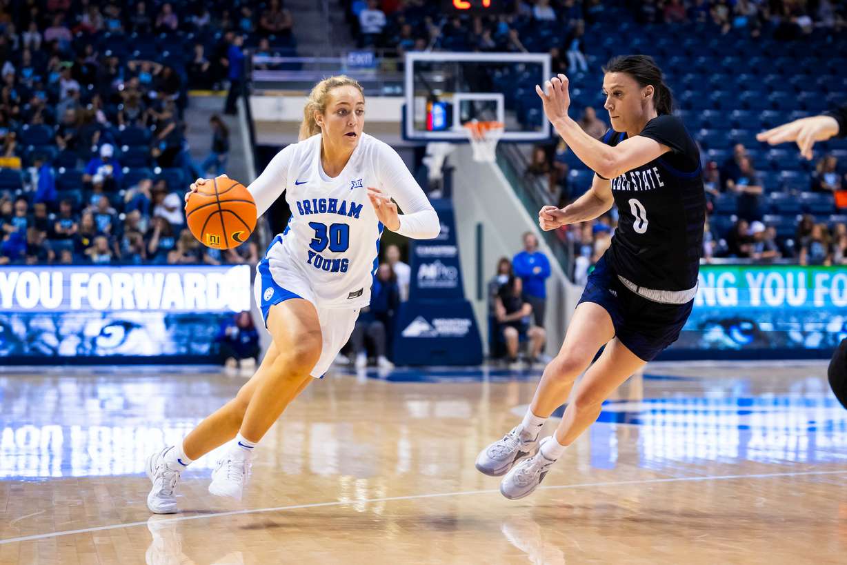 BYU guard Lauren Davenport drives to the basket during an NCAA women's basketball game against Weber State, Nov. 10, 2023, in the Marriott Center in Provo.