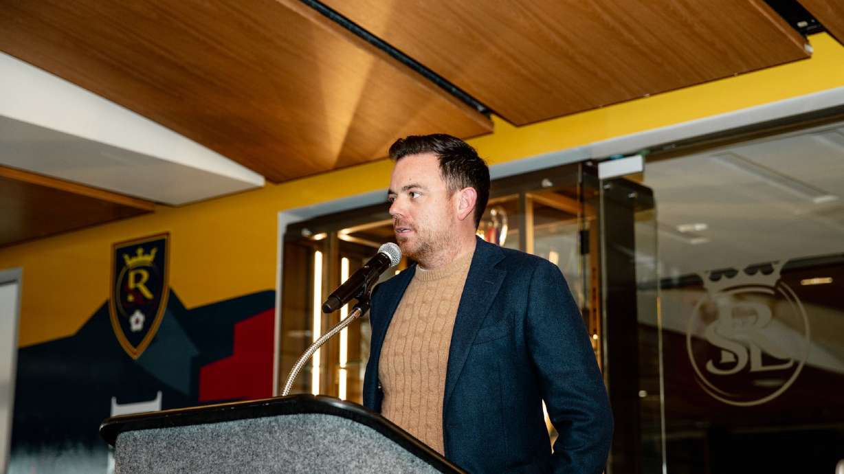 Real Salt Lake general manager Elliot Fall addresses supporters.