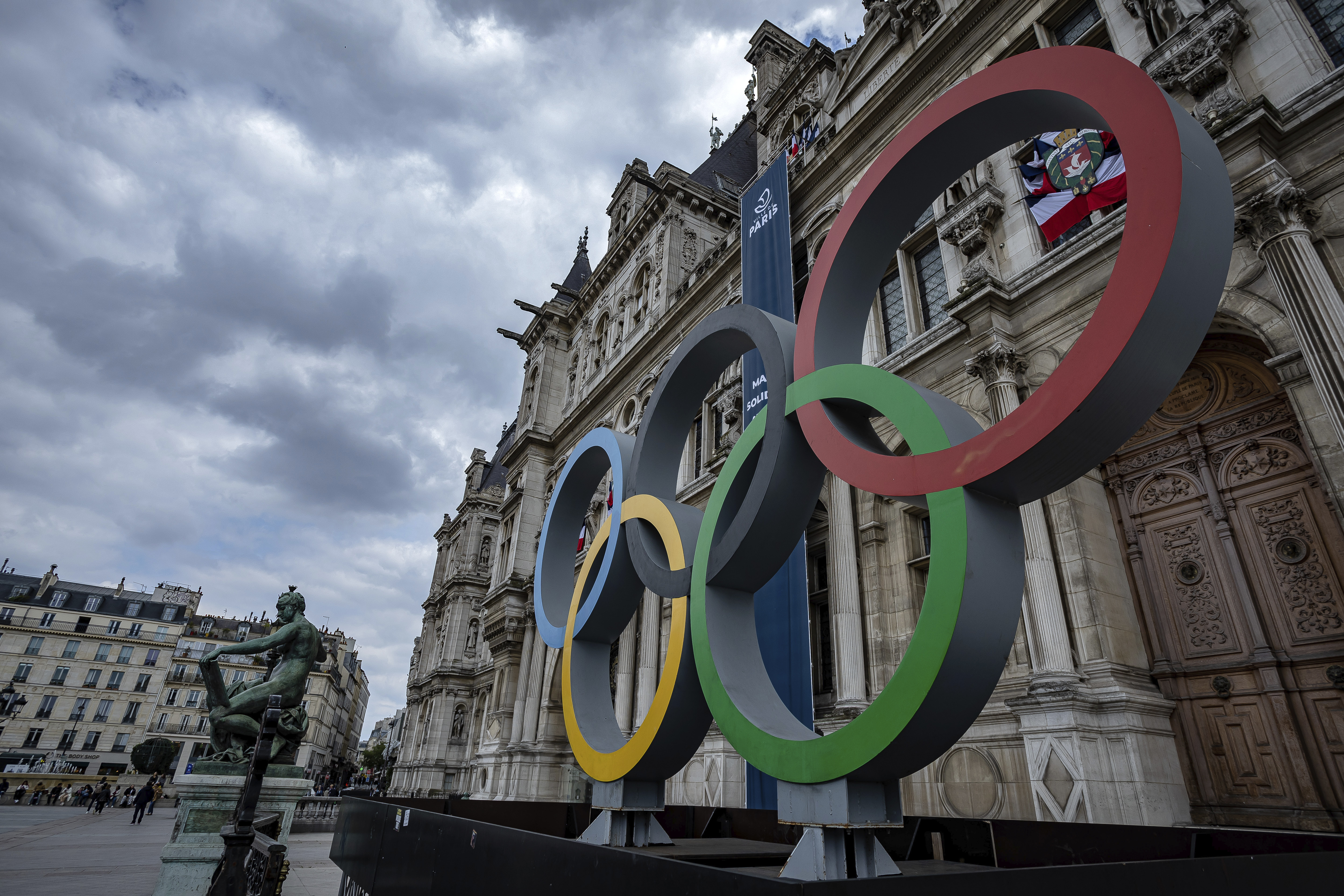 FILE - The Olympic rings are seen in front of the Paris City Hall, in Paris, on April 30, 2023. The International Gymnastics Federation is allowing Russians and Belarusians to return as “individual neutral athletes” without national symbols from Jan. 1, in line with the International Olympic Committee’s recommendations. However, European Gymnastics said its members voted Friday Dec. 1, 2023 not to comply with that plan.