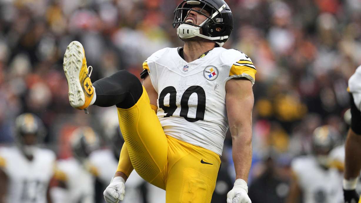 Pittsburgh Steelers linebacker T.J. Watt (90) celebrate sacking Cincinnati Bengals quarterback Jake Browning during the second half of an NFL football game in Cincinnati, Sunday, Nov. 26, 2023. The Steelers won 16-10.