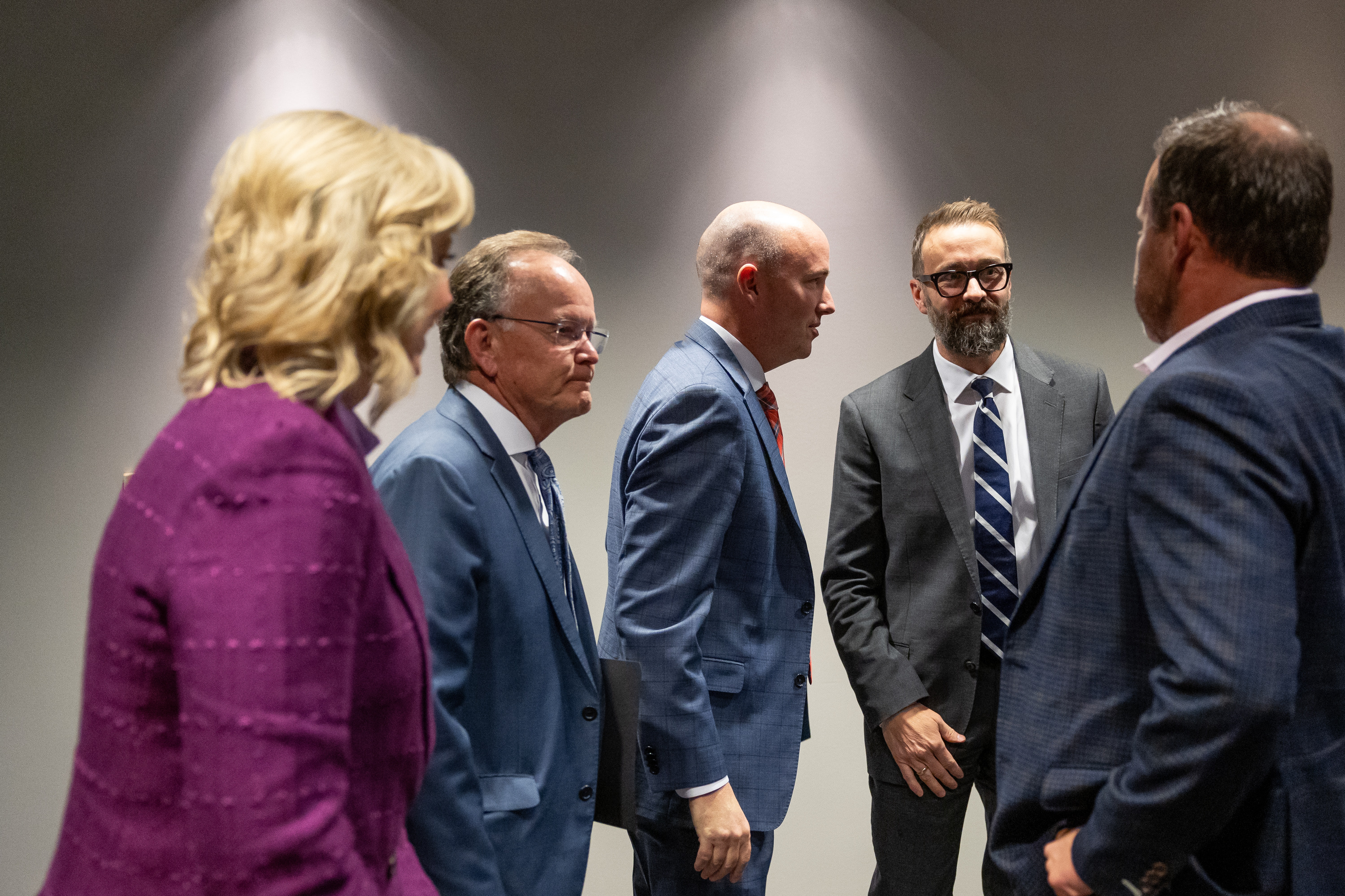 Gov. Spencer Cox, center, is flanked by government officials after a press conference on campus free speech at the Utah System of Higher Education office in Salt Lake City on Friday. From left to right are Amanda Covington, Senate President Stuart Adams, R-Layton; Cox; Geoffrey Landward, and House Speaker Mike Schultz, R-Hooper.