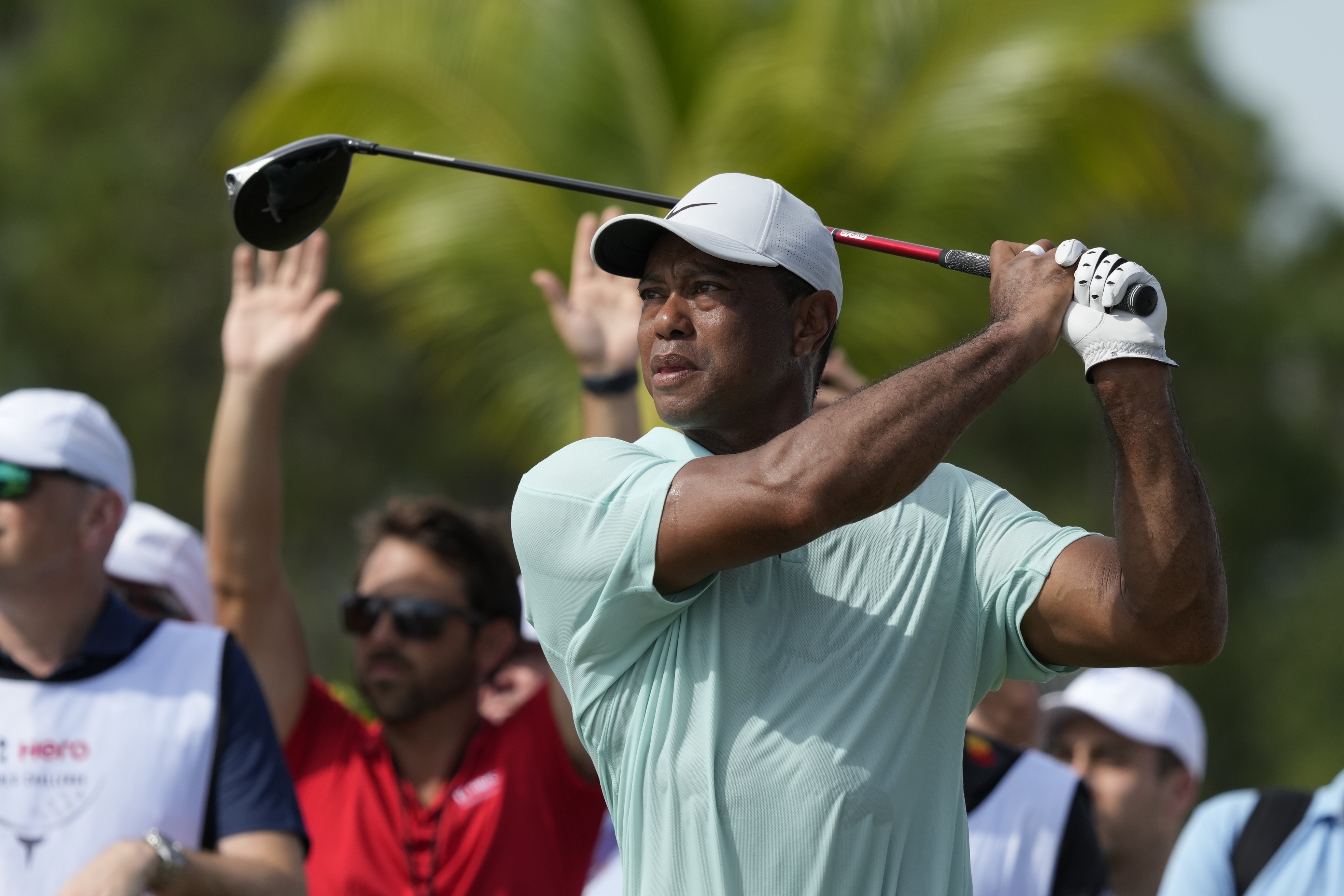 Tiger Woods watches his shot on the fourth tee during the third round of the Hero World Challenge PGA Tour at the Albany Golf Club, in New Providence, Bahamas, Saturday, Dec. 2, 2023.