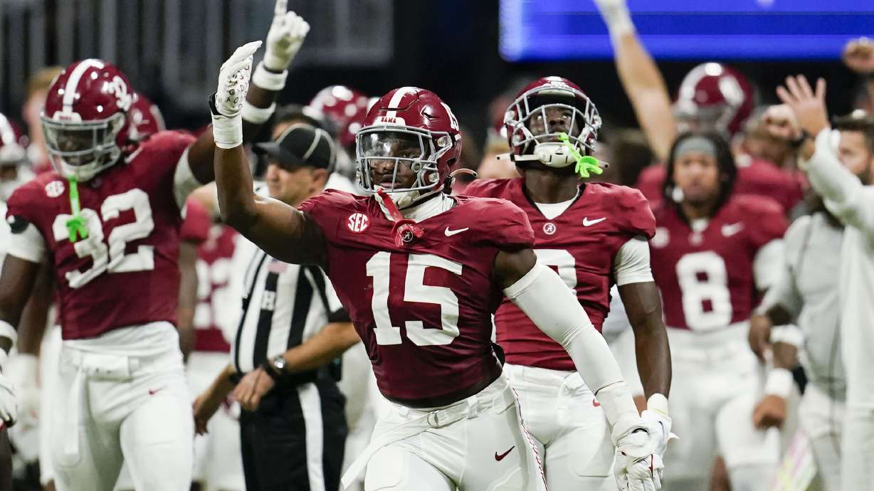 Alabama linebacker Dallas Turner (15) celebrates after taking down Georgia offense during the second half of the Southeastern Conference championship NCAA college football game in Atlanta, Saturday, Dec. 2, 2023.