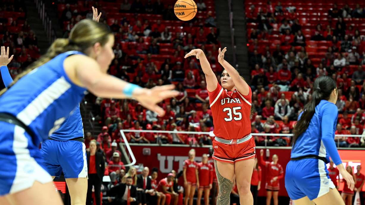 Utah Utes forward Alissa Pili (35) puts up and drops in a 3-point shot as Utah and BYU women play at the Huntsman Center in Salt Lake City on Saturday, Dec. 2, 2023.
