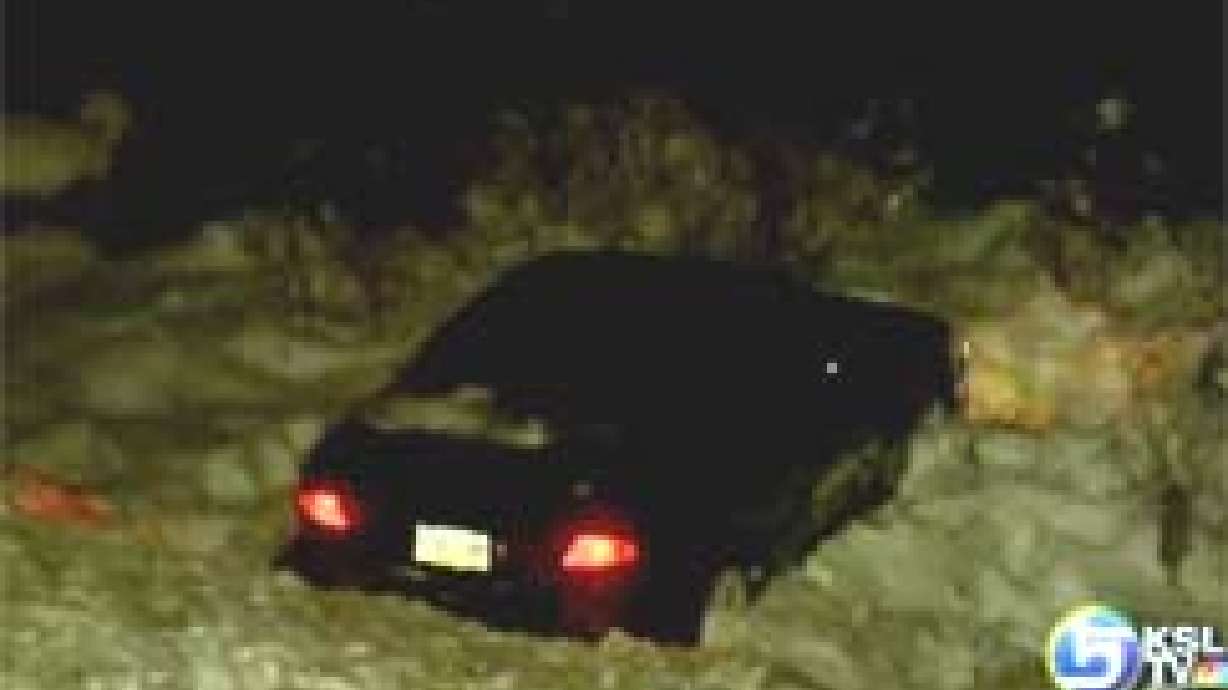 Ice on Road Sends Car Over Cliff