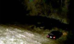 Ice on Road Sends Car Over Cliff