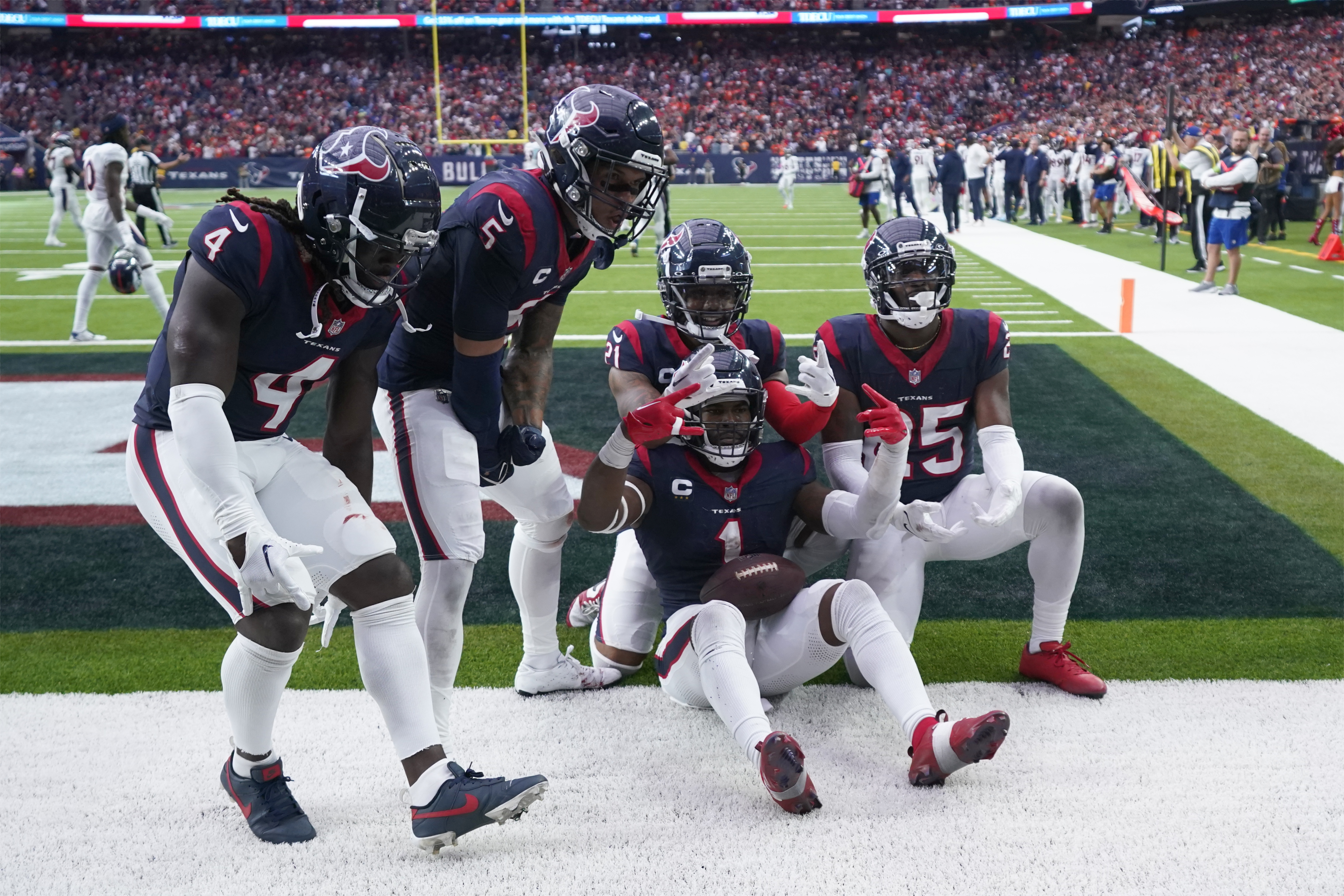 Houston Texans safety Jimmie Ward (1) celebrates his interception to stop the final drive of the Denver Broncos in the fourth quarter of an NFL football game Sunday, Dec. 3, 2023, in Houston. The Texans won 22-17.