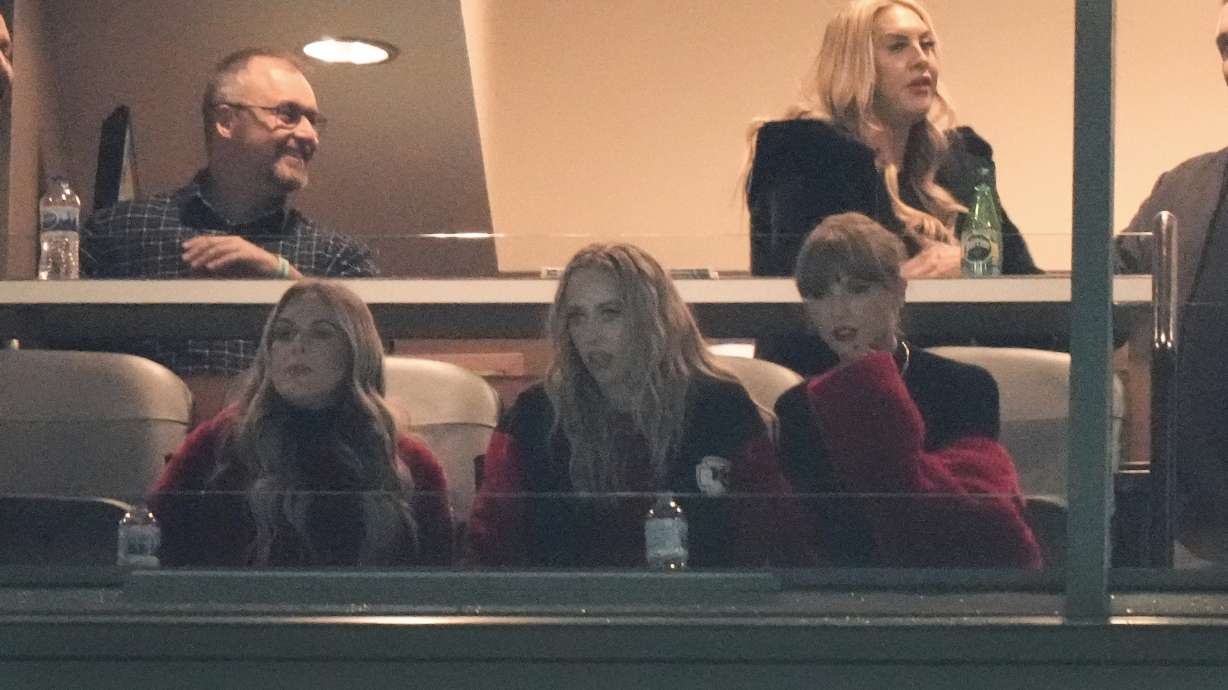 Taylor Swift, lower right, looks out on Lambeau Field during warmups before an NFL football game between the Kansas City Chiefs and Green Bay Packers, Sunday, Dec. 3, 2023 in Green Bay, Wis.