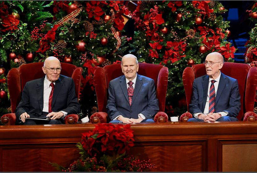 President Russell M. Nelson of The Church of Jesus Christ of Latter-day Saints sits between his counselors, President Dallin H. Oaks and President Henry B. Eyring, at the First Presidency Christmas Devotional on Sunday in Salt Lake City.