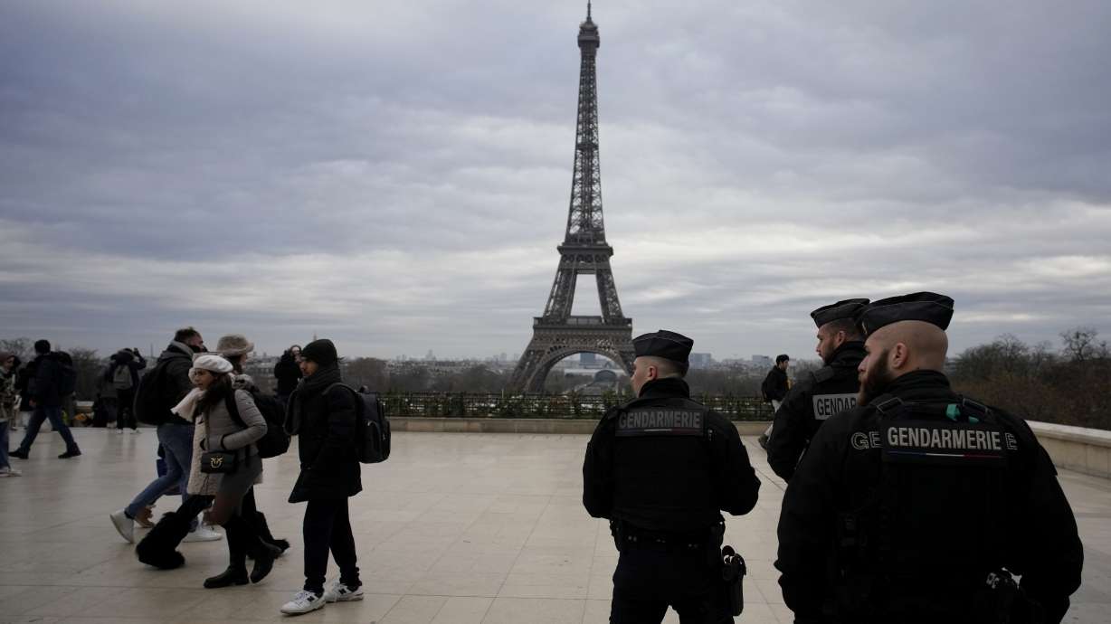 French gendarmes patrol the Trocadero plaza near the Eiffel Tower after a man targeted passersbys late saturday, killing a German tourist with a knife and injuring two others in Paris, Sunday, Dec. 3, 2023. Police subdued the man, a 25-year-old French citizen who had spent four years in prison for a violent offense. After his arrest, he expressed anguish about Muslims dying, notably in the Palestinian territories.