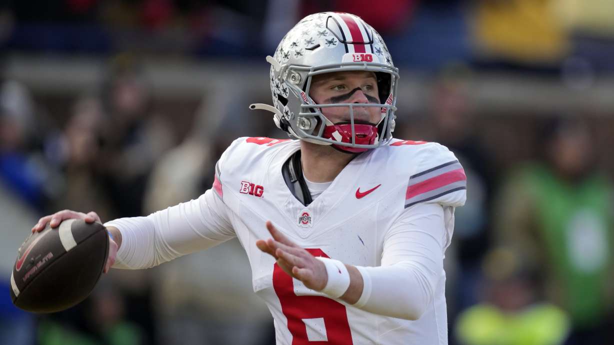 Ohio State quarterback Kyle McCord throws during the first half of an NCAA college football game against Michigan, Saturday, Nov. 25, 2023, in Ann Arbor, Mich.