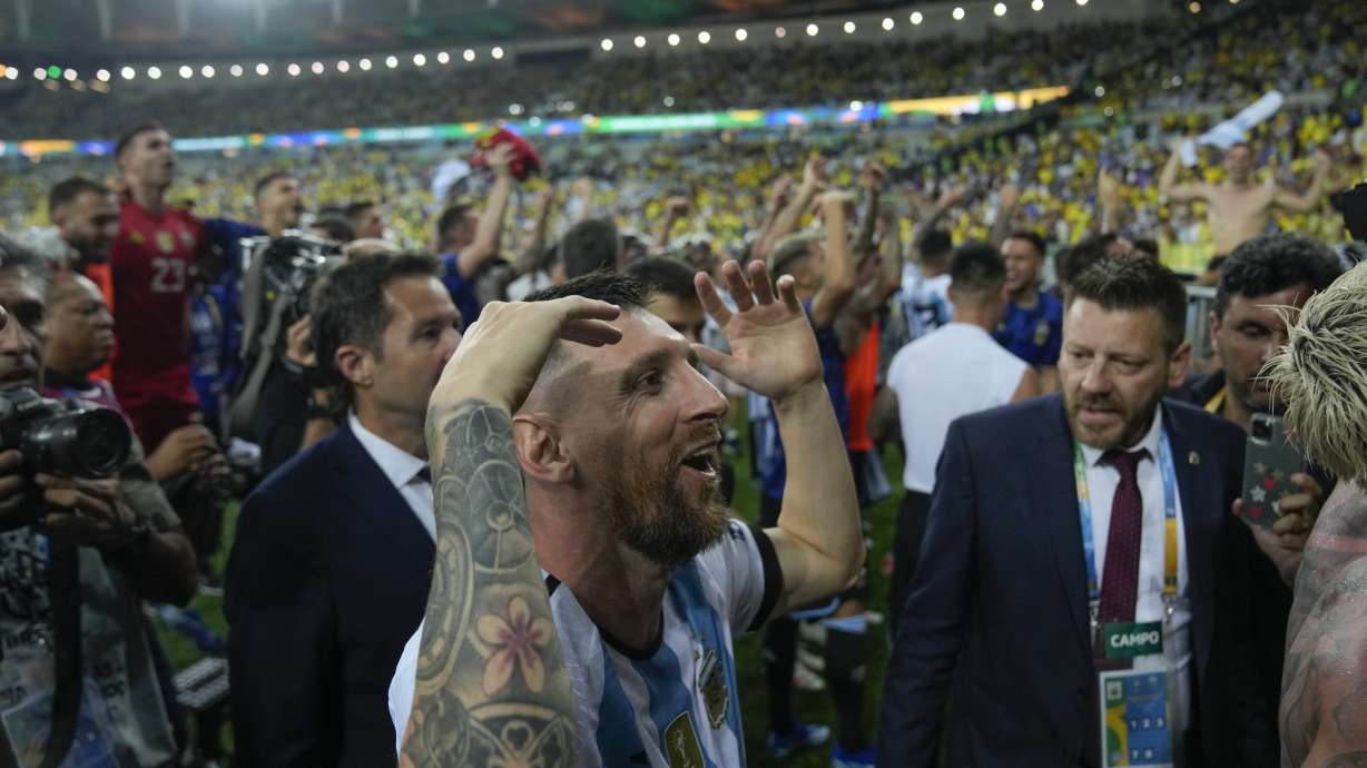 Argentina's Lionel Messi and teammates celebrate their team's 1-0 victory over Brazil at the end of a qualifying soccer match for the FIFA World Cup 2026 at Maracana stadium in Rio de Janeiro, Brazil, Tuesday, Nov. 21, 2023.