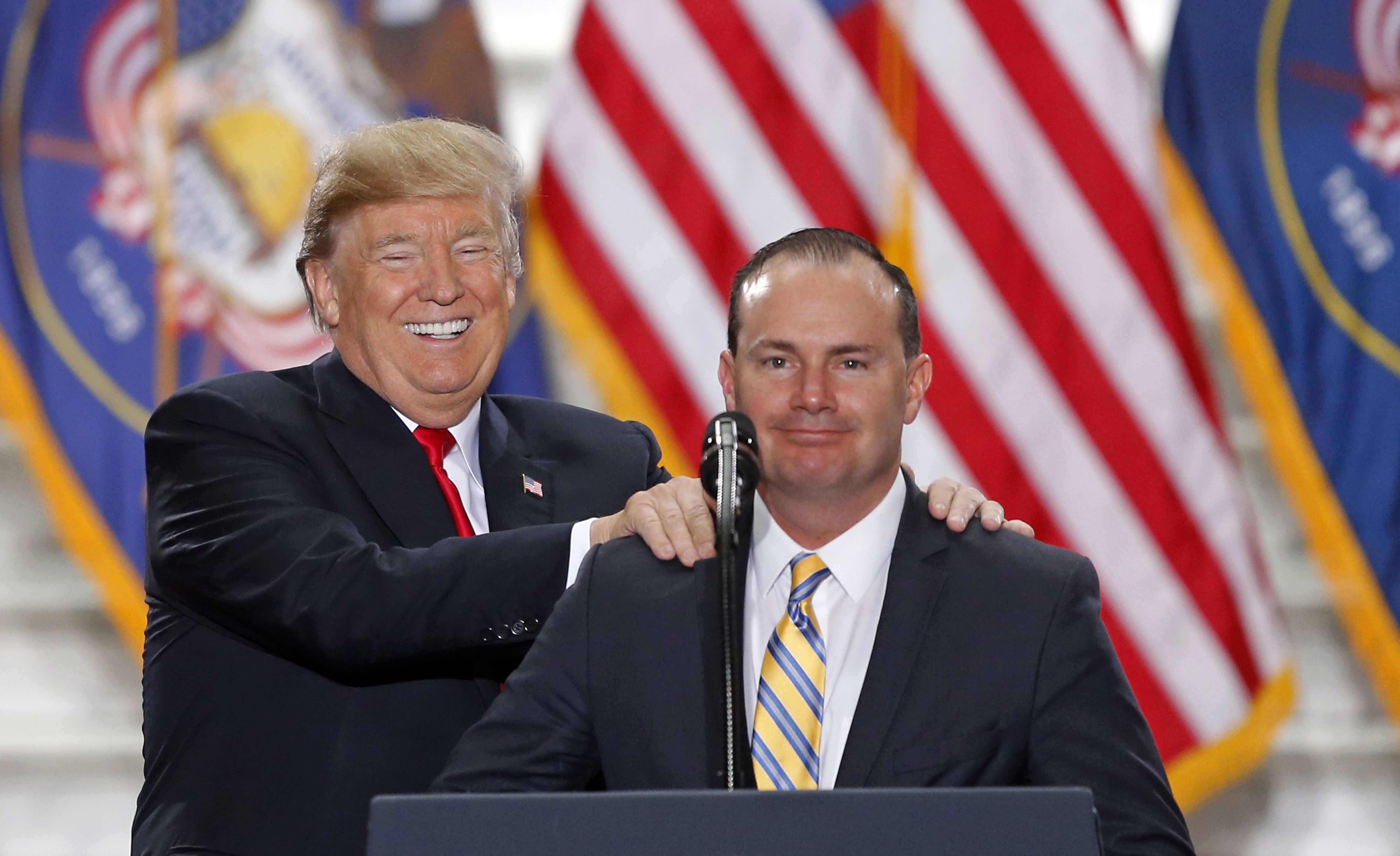 President Donald Trump stands with Sen. Mike Lee, R-Utah, at the state Capitol in 2017. Lee was listed as a possible U.S. attorney general in a second Trump administration.