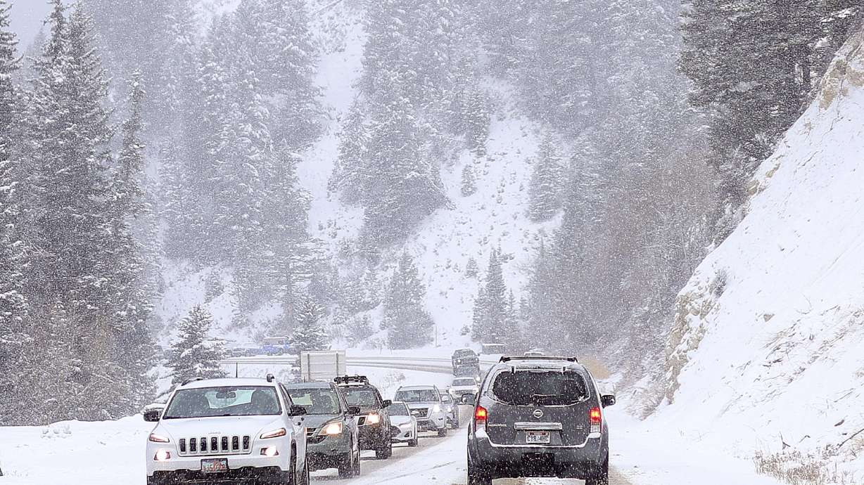 Motorists drive in Big Cottonwood Canyon on Friday. Avalanche risks remain high in the Cottonwood canyons and there are some closures planned Monday night and Tuesday related to testing.