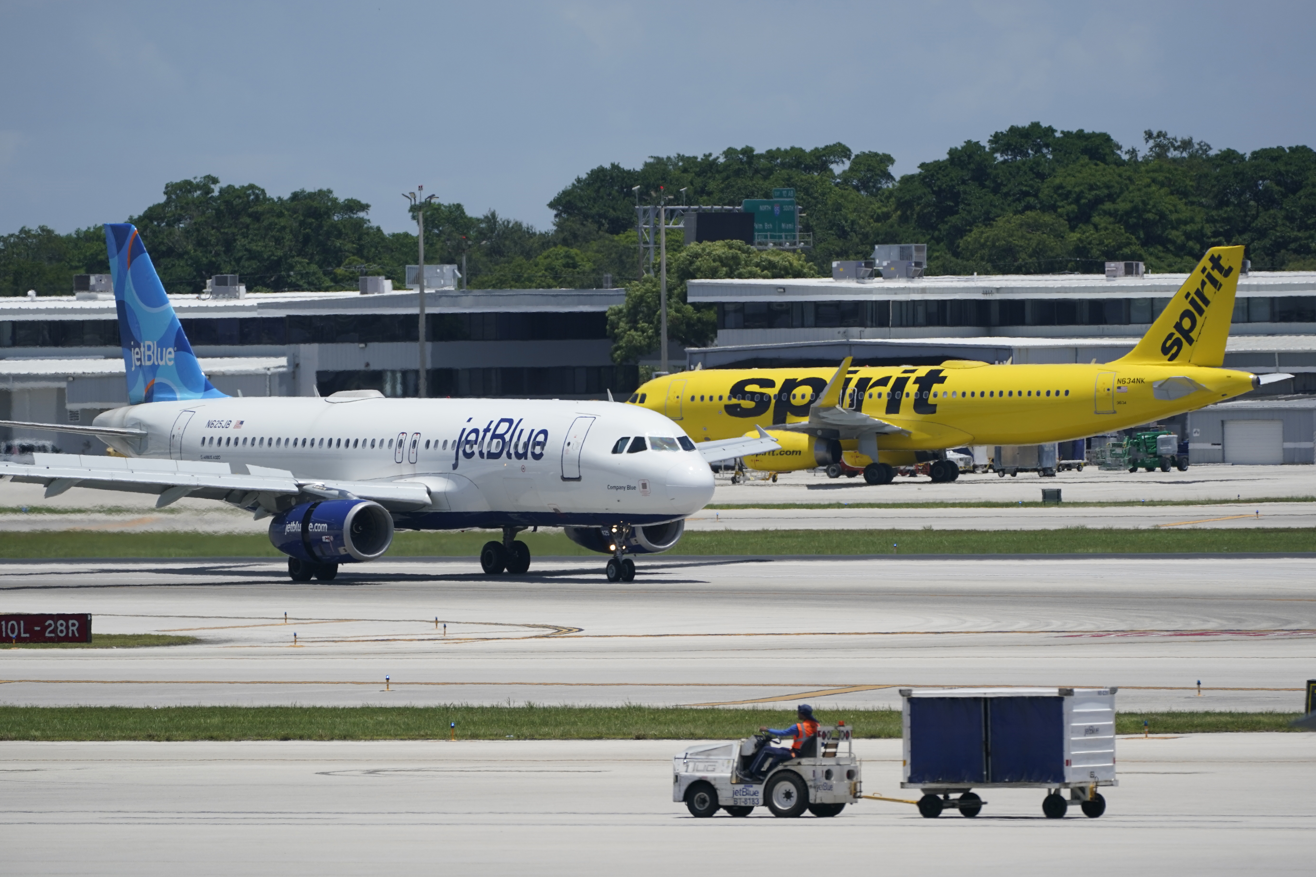 A Spirit Airlines Airbus A320 taxis on the runway at the Fort Lauderdale-Hollywood International Airport in Fort Lauderdale, Fla. on July 7, 2022. Spirit Airlines apologized to a family after an unaccompanied 6-year-old child was placed on the wrong flight.