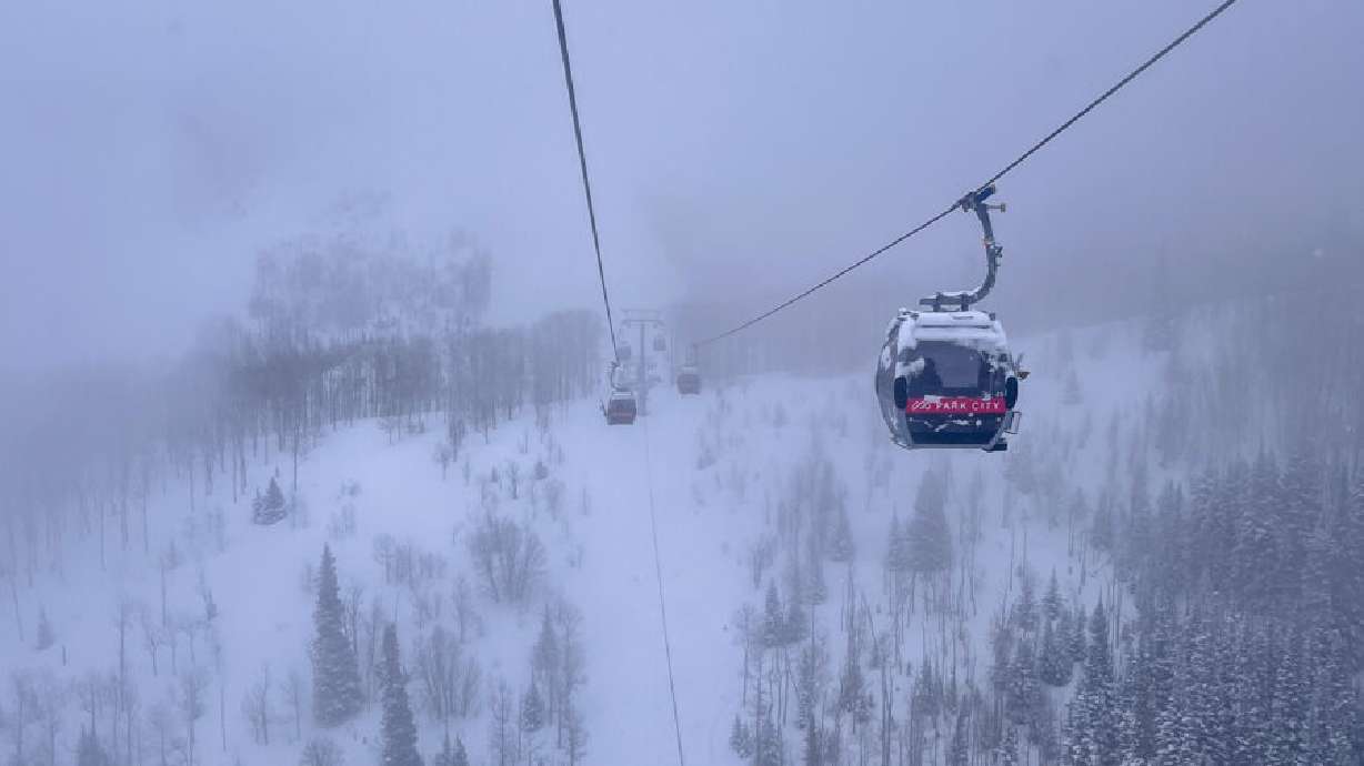 Quicksilver gondola cabins travel along a cable on a snowy day at Park City Mountain Resort. The proposed Sunrise gondola would be the third gondola at Park City Mountain Resort.